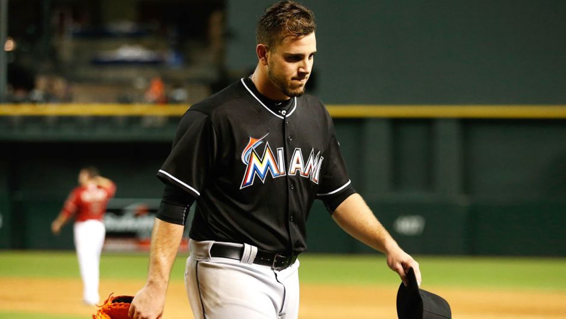 PHOENIX, AZ - JULY 22: Starting pitcher Jose Fernandez #16 of the Miami Marlins walks to the dugout following the sixth inning of the MLB game against the Arizona Diamondbacks at Chase Field on July 22, 2015 in Phoenix, Arizona. (Photo by Christian Petersen/Getty Images)