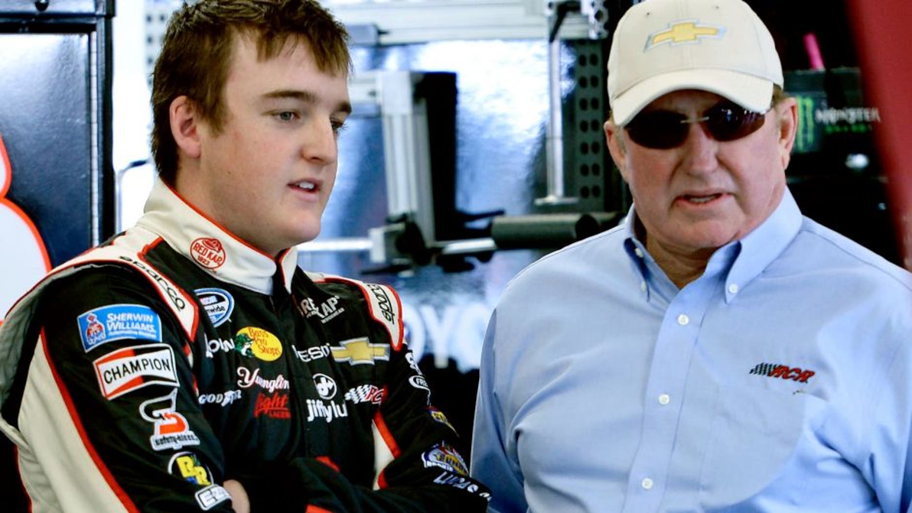 LAS VEGAS, NV - MARCH 07: Ty Dillon (left), driver of the #3 VF-Jiffy Lube Chevrolet, talks with Richard Childress, owner of Richard Childress Racing, during practice for the NASCAR Nationwide Series Boyd Gaming 300 at Las Vegas Motor Speedway on March 7, 2014 in Las Vegas, Nevada. (Photo by Jeff Bottari/Getty Images)