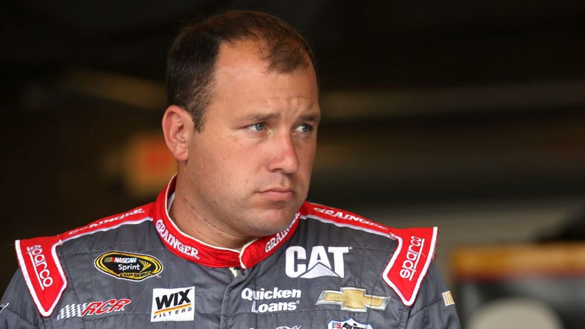 INDIANAPOLIS, IN - JULY 24: Ryan Newman, driver of the #31 Grainger Chevrolet, stands in the garage area during practice for the NASCAR Sprint Cup Series Crown Royal Presents the Jeff Kyle 400 at the Brickyard at Indianapolis Motorspeedway on July 24, 2015 in Indianapolis, Indiana. (Photo by Chris Graythen/Getty Images)