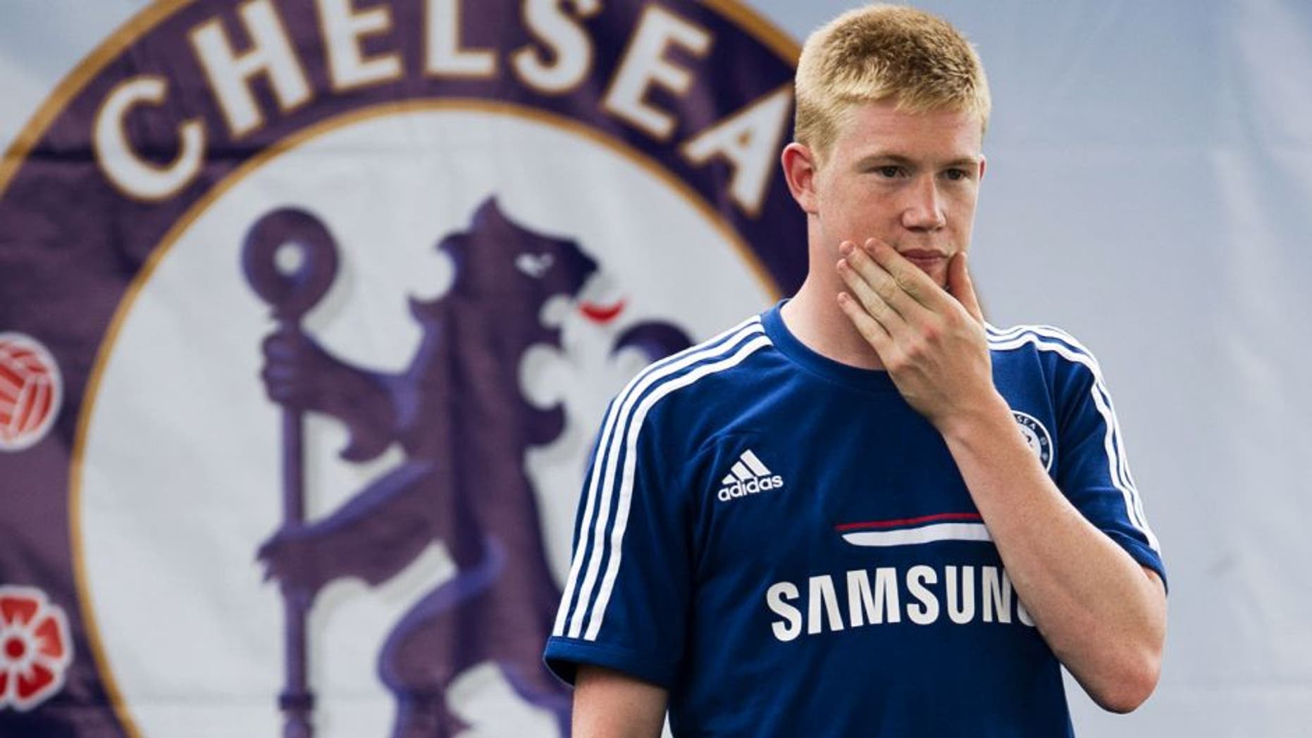 Chelsea football player Kevin De Bruyne gestures during an exhibition training with Thai children at the super kick stadium in Bangkok on July 12, 2013. Jose Mourinho has warned that he is returning to Chelsea as a much better manager as he bids to win back the Premier League trophy and secure an elusive Champions League title with the London club. AFP PHOTO / Nicolas ASFOURI (Photo credit should read NICOLAS ASFOURI/AFP/Getty Images)