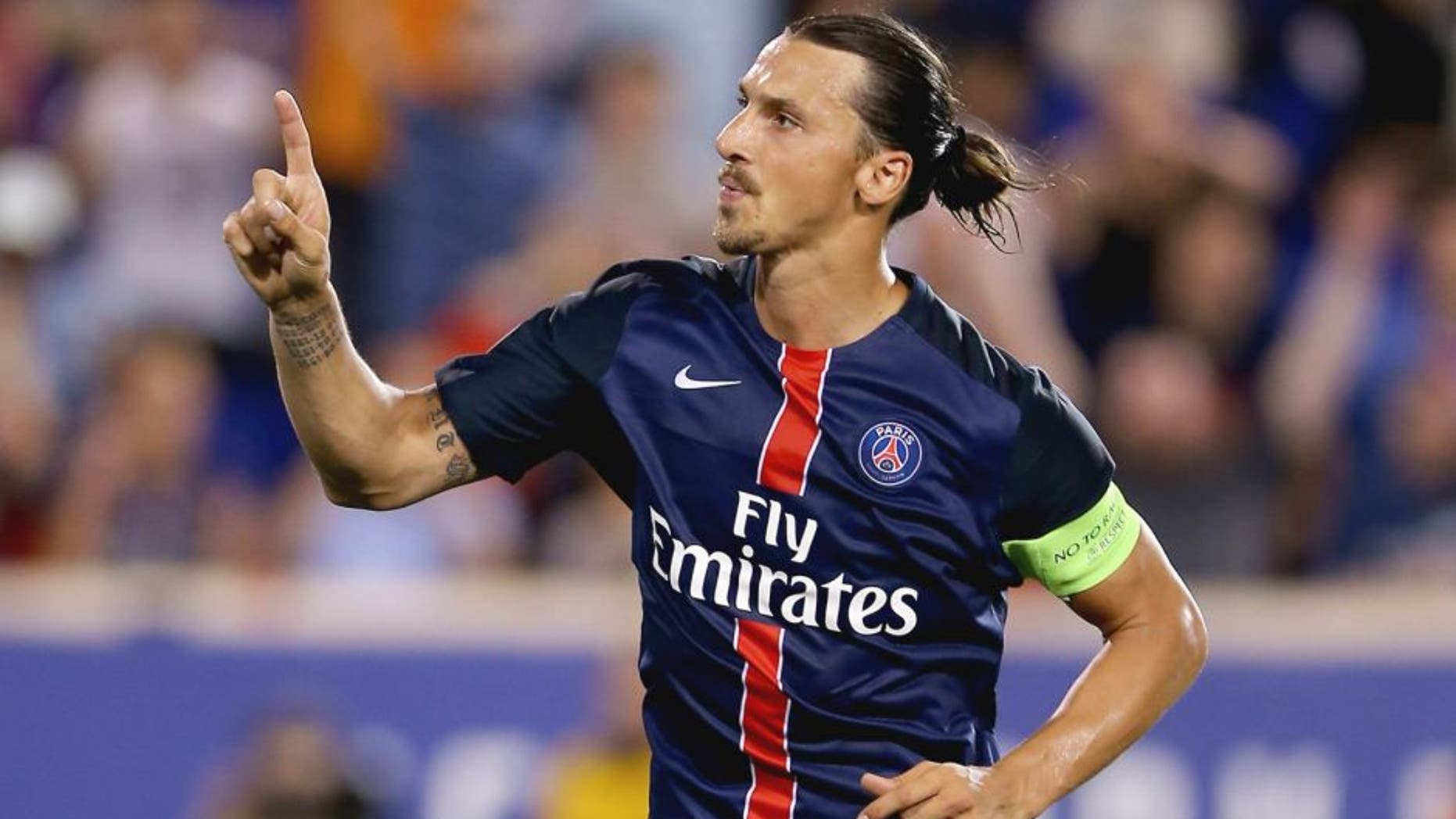 HARRISON, NJ - JULY 21: Zlatan Ibrahimovic #10 of Paris Saint-Germain celebrates his goal in the second half against AFC Fiorentina during the International Champions Cup at Red Bull Arena on July 21, 2015 in Harrison, New Jersey.Paris Saint-Germain defeated ACF Fiorentina 4-2. (Photo by Elsa/Getty Images)