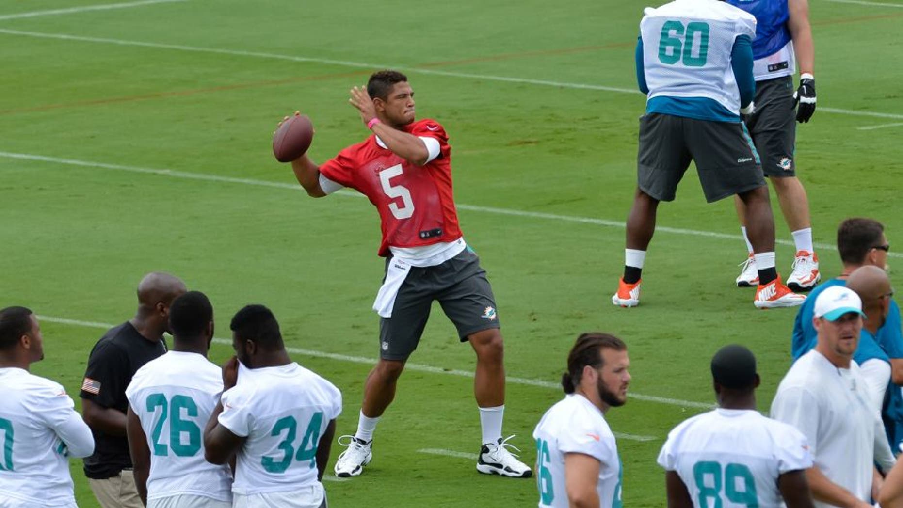 May 26, 2015; Miami, FL, USA; Miami Dolphins quarterback Josh Freeman (5) during practice drills at Miami Dolphins Training Facility. Mandatory Credit: Steve Mitchell-USA TODAY Sports