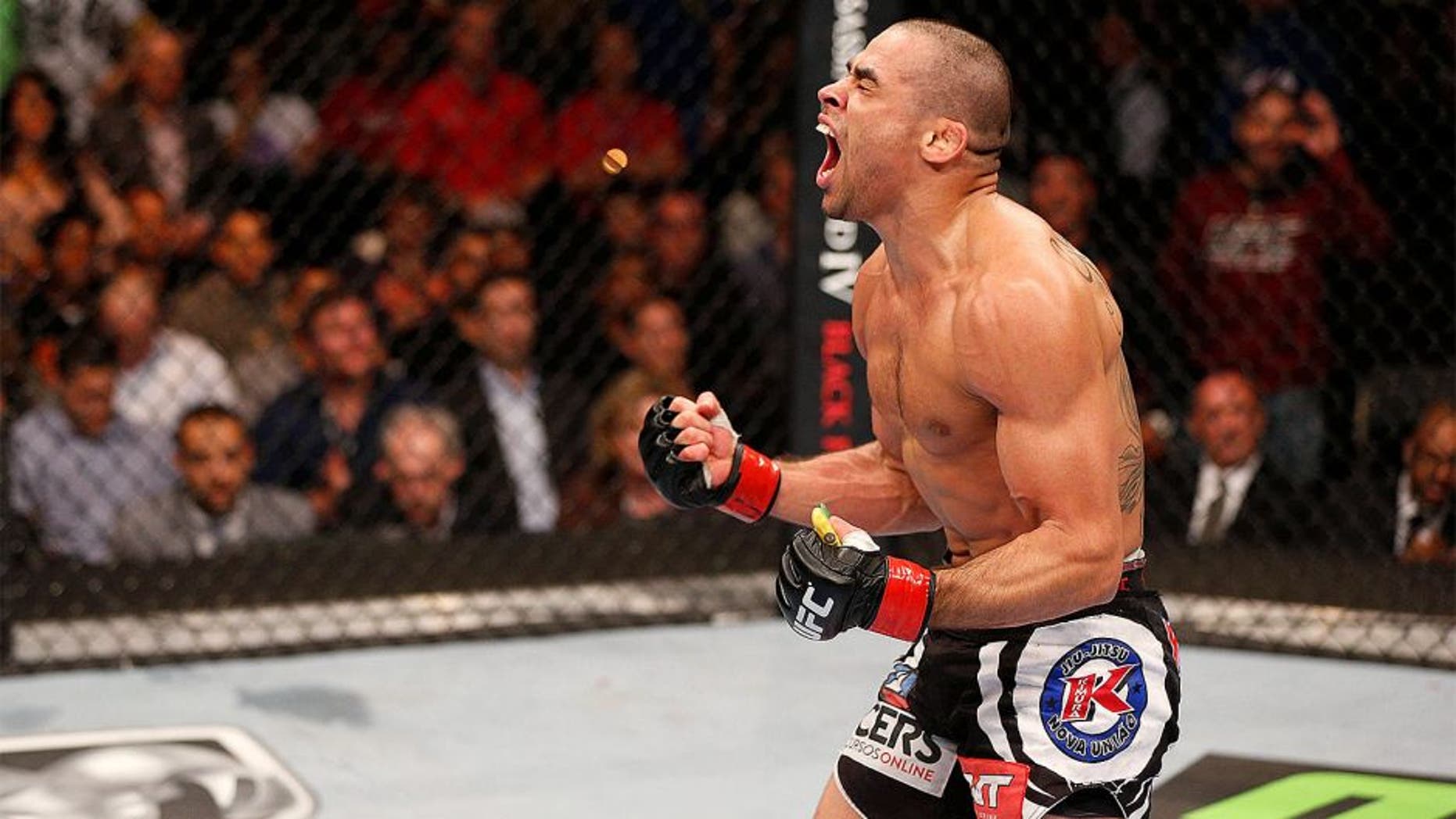 TORONTO, CANADA - SEPTEMBER 21: Renan 'The Baron' Barao celebrates after defeating Eddie Wineland (not pictured) in their UFC interim bantamweight title fight at the Air Canada Center on September 21, 2013 in Toronto, Ontario, Canada. (Photo by Josh Hedges/Zuffa LLC/Zuffa LLC via Getty Images) *** Local Caption *** Renan Barao