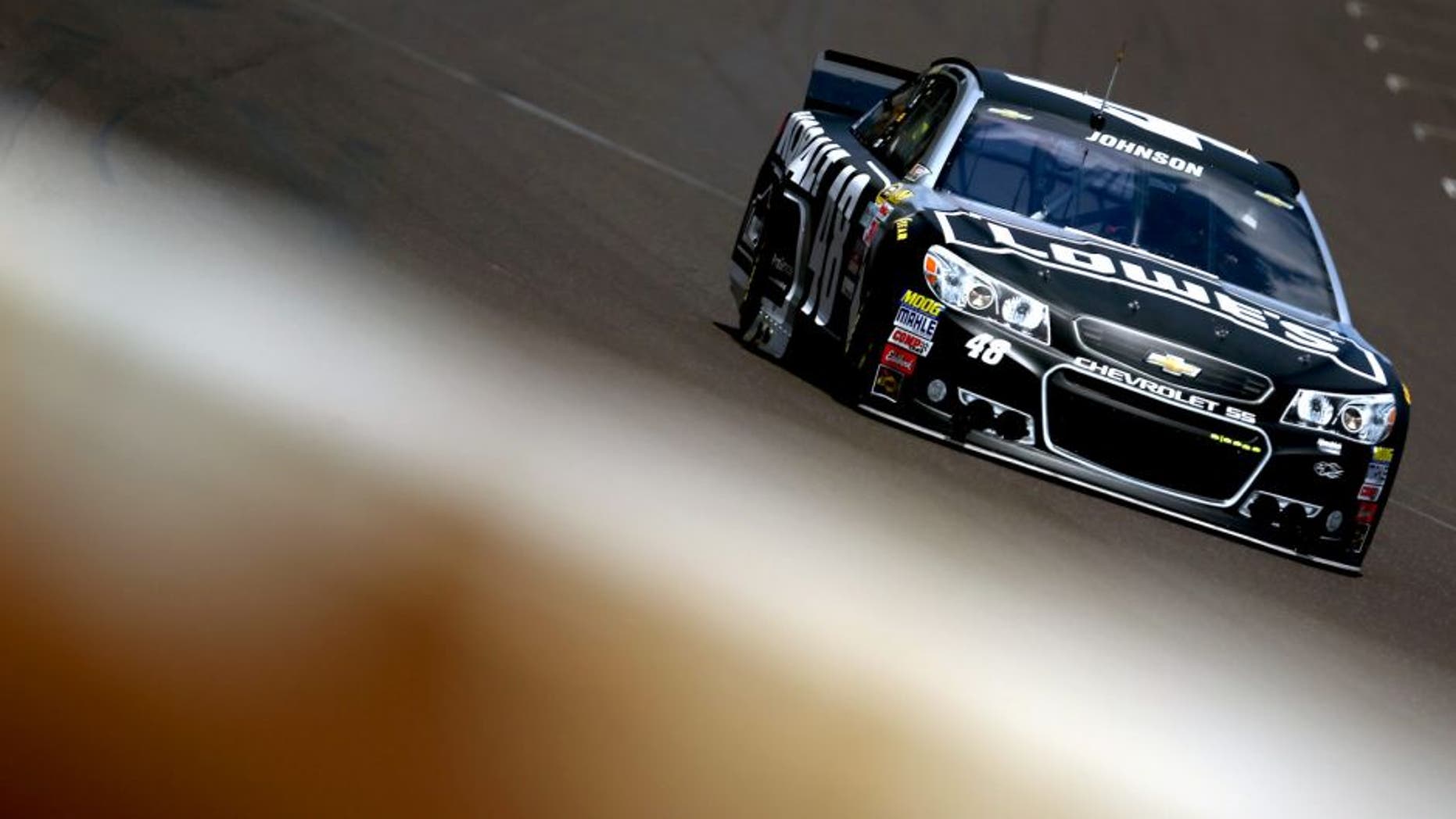 INDIANAPOLIS, IN - JULY 24: Jimmie Johnson, driver of the #48 Kobalt Tools Chevrolet, practices for the NASCAR Sprint Cup Series Crown Royal Presents the Jeff Kyle 400 at the Brickyard at Indianapolis Motorspeedway on July 24, 2015 in Indianapolis, Indiana. (Photo by Sarah Crabill/NASCAR via Getty Images)