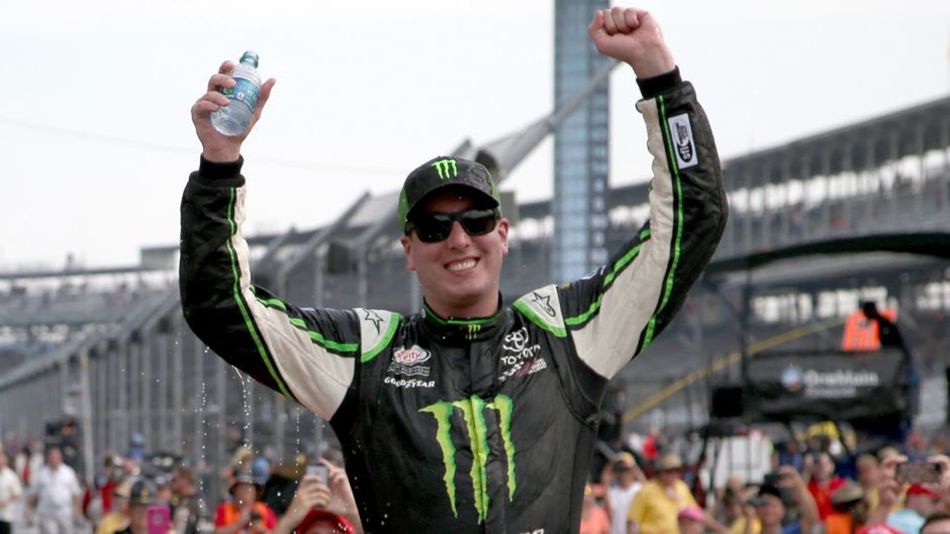 INDIANAPOLIS, IN - JULY 25: Kyle Busch, driver of the #54 Monster Energy Toyota, celebrates in Victory Lane after winning the NASCAR XFINITY Series Lilly Diabetes 250 at Indianapolis Motor Speedway on July 25, 2015 in Indianapolis, Indiana. (Photo by Brian Lawdermilk/Getty Images)