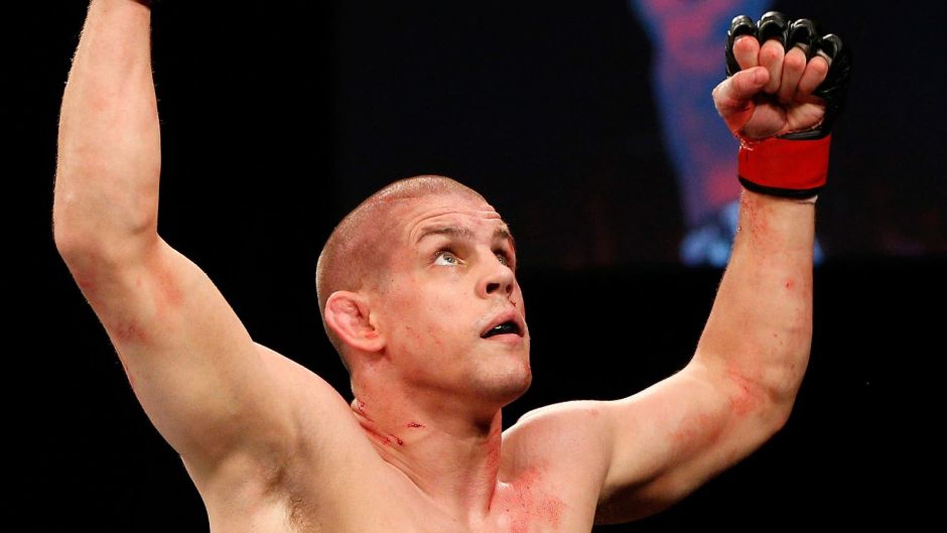 MASHANTUCKET, CT - SEPTEMBER 05: Joe Lauzon celebrates after defeating Michael Chiesa in their lightweight bout during the UFC Fight Night event at Foxwoods Resort Casino on September 5, 2014 in Mashantucket, Connecticut. (Photo by Josh Hedges/Zuffa LLC/Zuffa LLC via Getty Images)