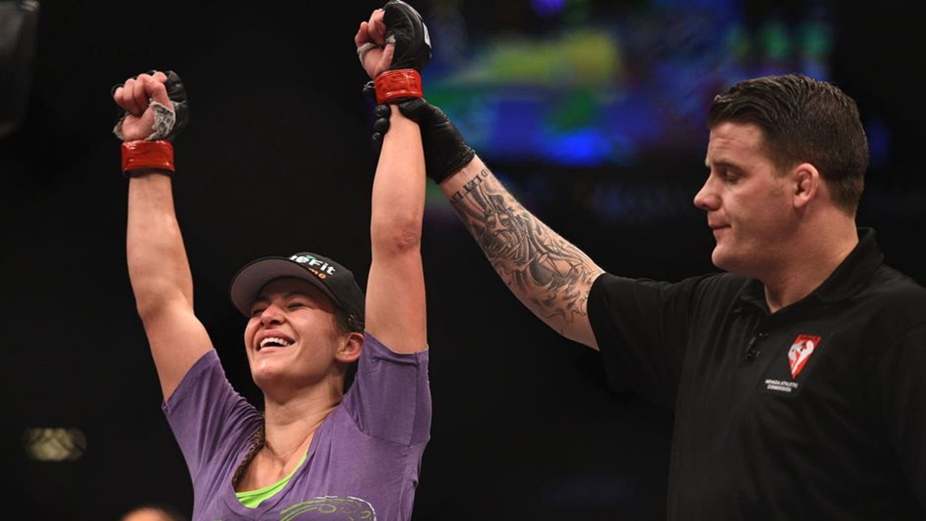 LAS VEGAS, NV - JANUARY 31: Miesha Tate reacts to her victory over Sara McMann in their women's bantamweight bout during the UFC 183 event at the MGM Grand Garden Arena on January 31, 2015 in Las Vegas, Nevada. (Photo by Jeff Bottari/Zuffa LLC/Zuffa LLC via Getty Images)