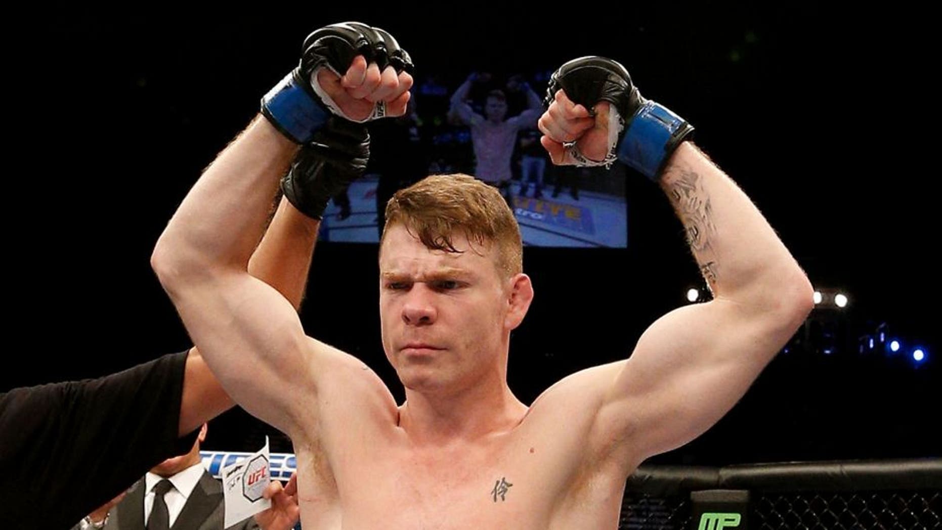 LAS VEGAS, NV - JANUARY 03: Paul Felder celebrates his win over Danny Castillo in their lightweight bout during the UFC 182 event at the MGM Grand Garden Arena on January 3, 2015 in Las Vegas, Nevada. (Photo by Josh Hedges/Zuffa LLC/Zuffa LLC via Getty Images)