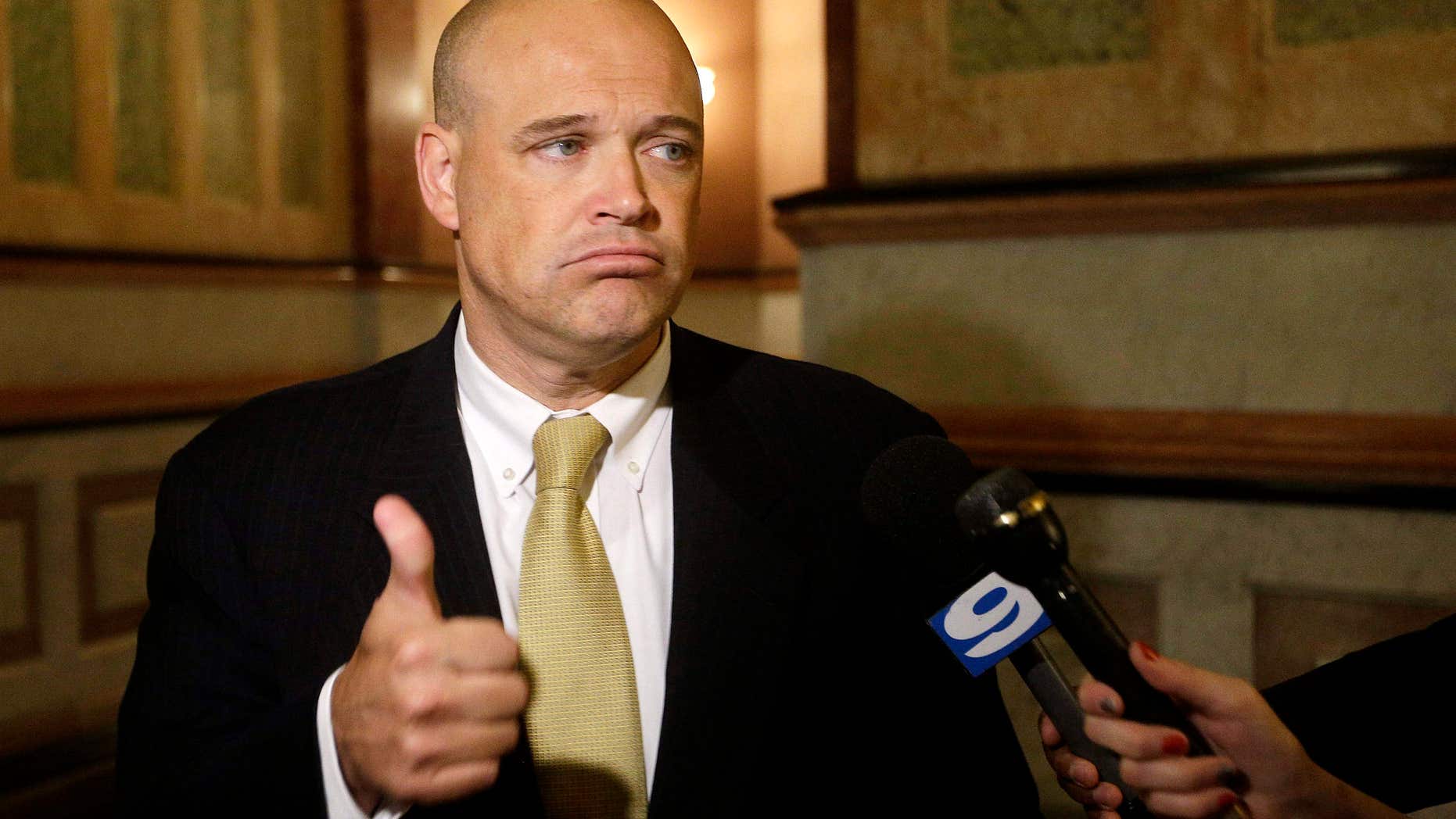 FILE - In this June 30, 2016 file photo, Illinois state Rep. Ron Sandack, R-Downers Grove, speaks to reporters at the state Capitol in Springfield.