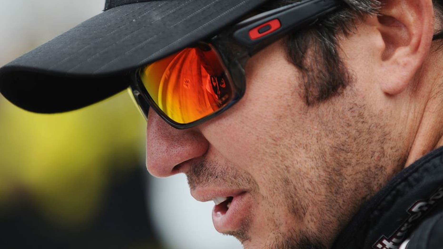 INDIANAPOLIS, IN - JULY 25: Martin Truex Jr., driver of the #78 Furniture Row/Visser Precision Chevrolet, sits on the grid during qualifying for the NASCAR Sprint Cup Series Crown Royal Presents the Jeff Kyle 400 at the Brickyard at Indianapolis Motor Speedway on July 25, 2015 in Indianapolis, Indiana. (Photo by Rainier Ehrhardt/NASCAR via Getty Images)