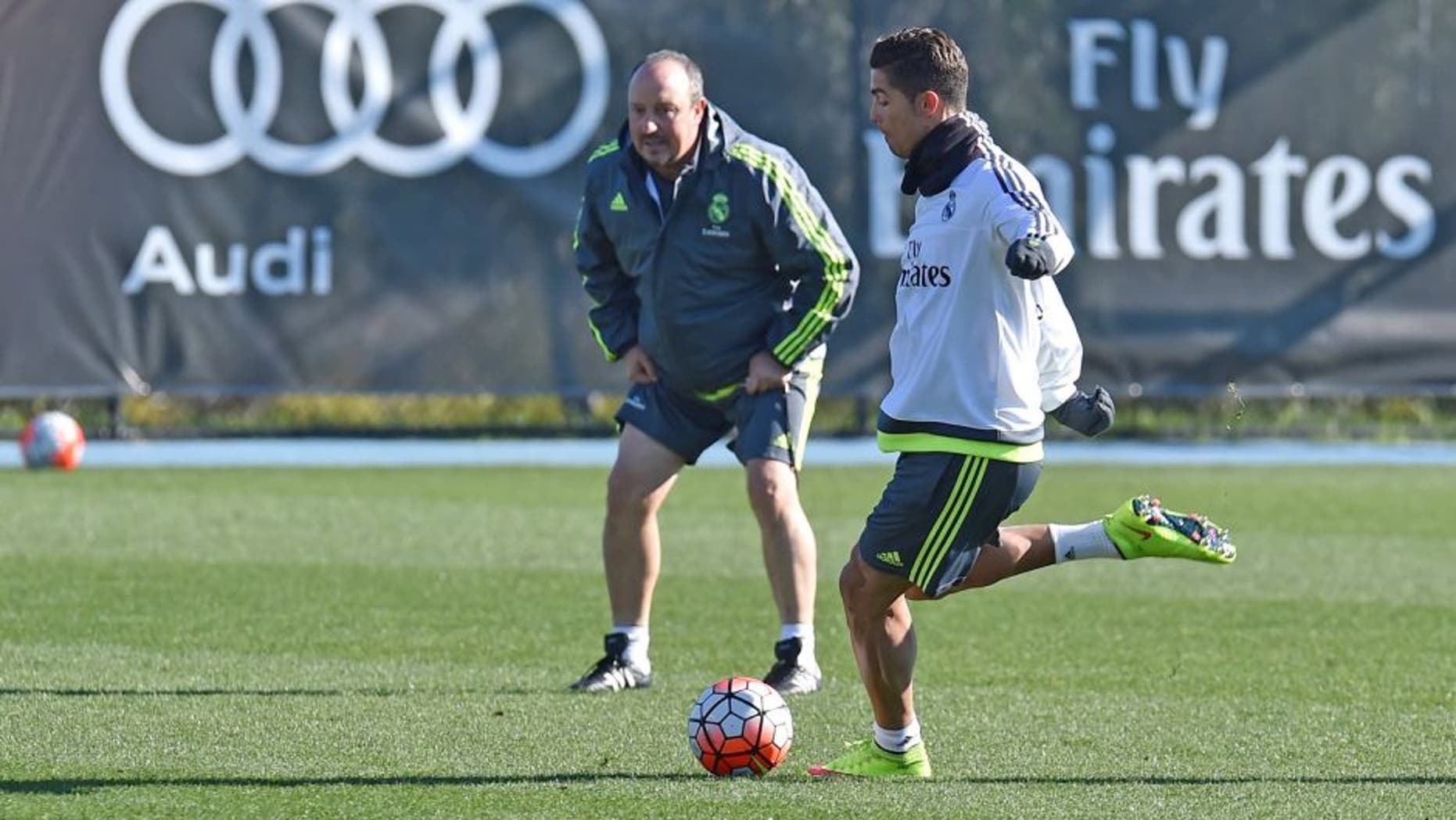 Real Madrid's coach Rafa Benitez (L) watches forward Cristiano Ronaldo (R) during a team training session during the International Champions Cup tournament in Melbourne on July 20, 2015. AFP PHOTO / Paul CROCK -- IMAGE RESTRICTED TO EDITORIAL USE - STRICTLY NO COMMERCIAL USE (Photo credit should read PAUL CROCK/AFP/Getty Images)