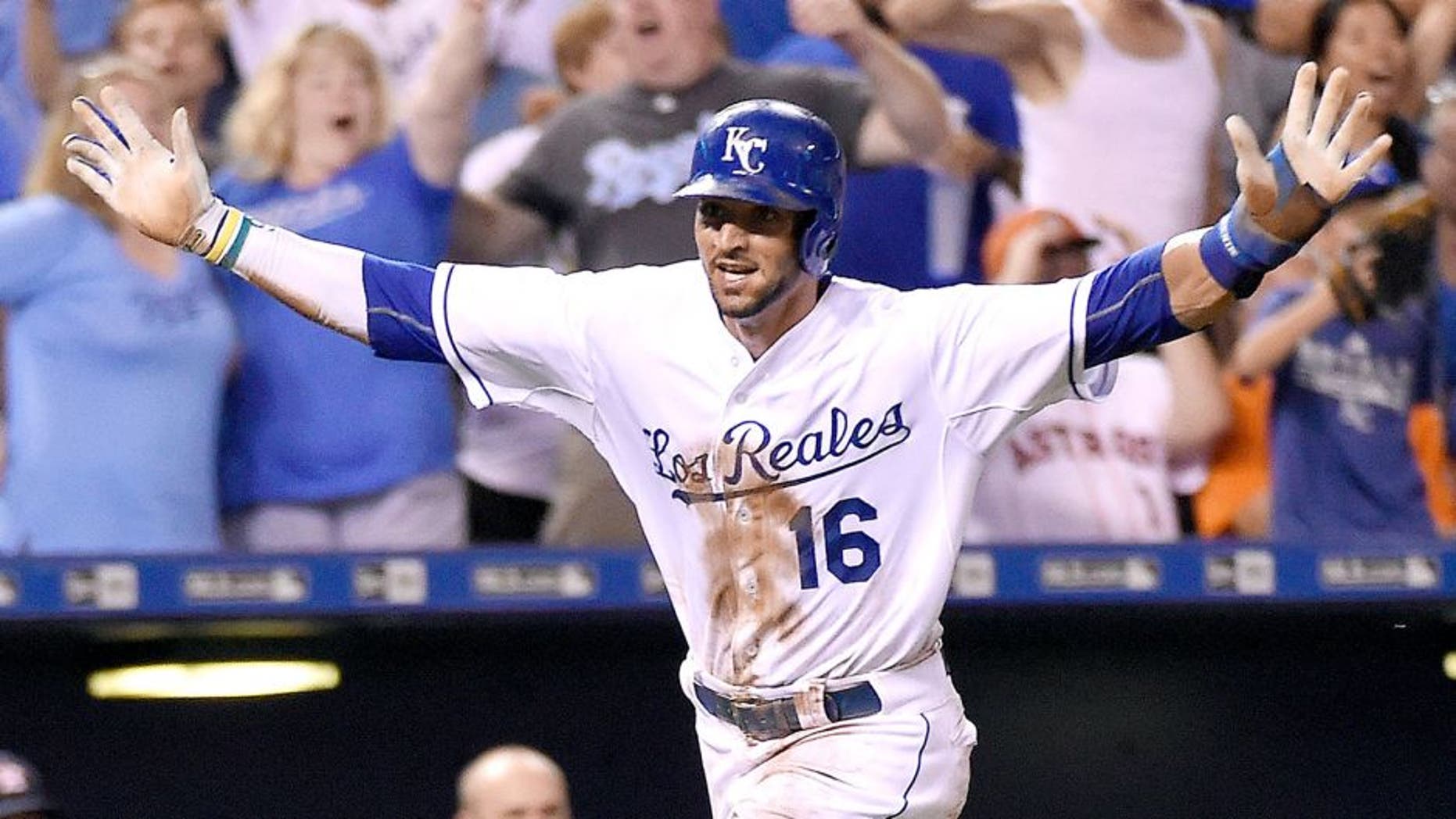 The Kansas City Royals' Paulo Orlando (16) heads for home to score the winning run on a hit by Alcides Escobar in the 10th inning for a 2-1 win against the Houston Astros on Saturday, July 25, 2015, at Kauffman Stadium in Kansas City, Mo. (John Sleezer/Kansas City Star/TNS via Getty Images)