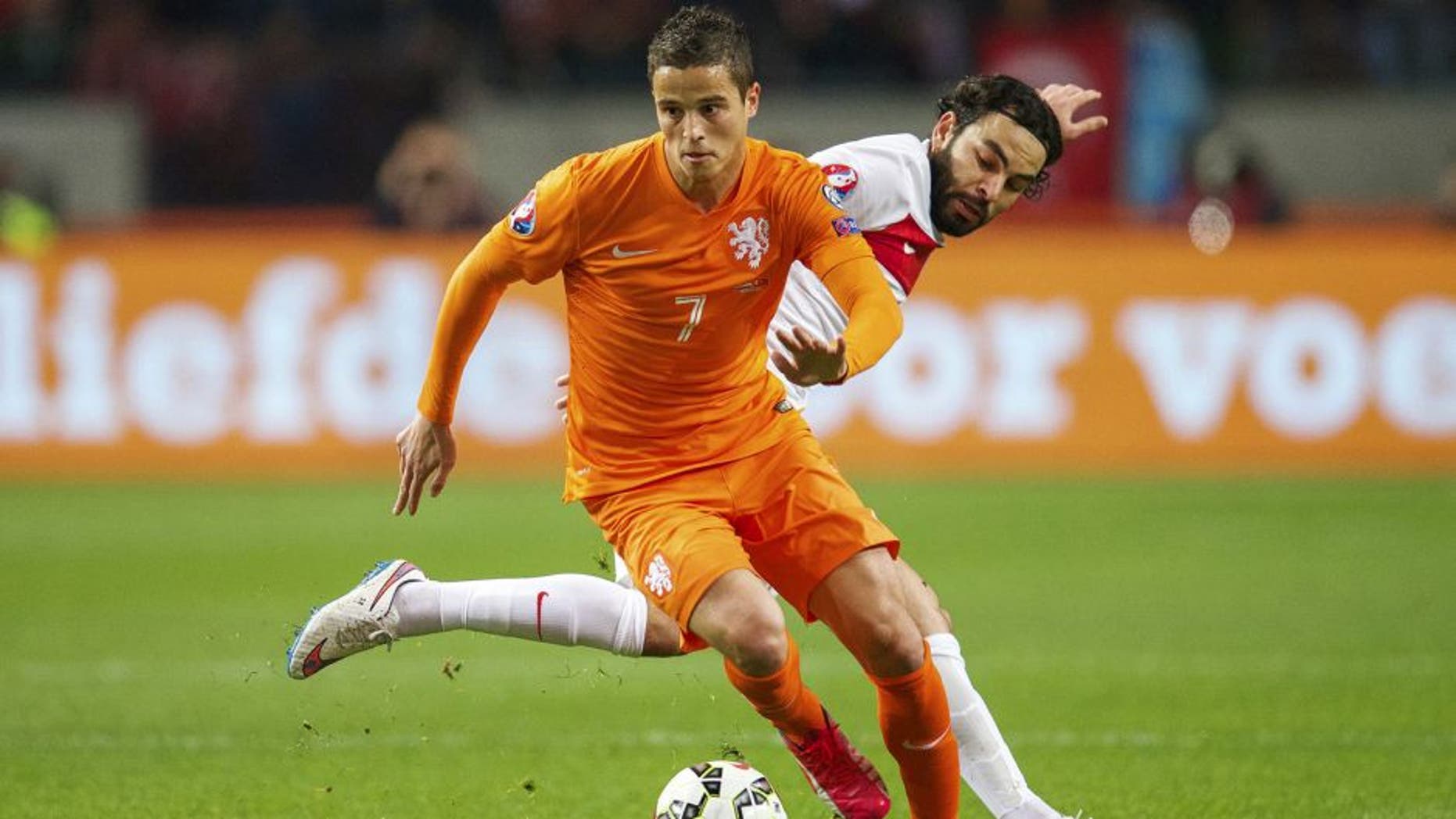(L-R) Ibrahim Afellay of Holland, Selcuk Inan of Turkye during the UEFA Euro 2016 qualifying match between Netherlands and Turkey on March 28, 2015 at the Amsterdam Arena at Amsterdam, The Netherlands.(Photo by VI Images via Getty Images)