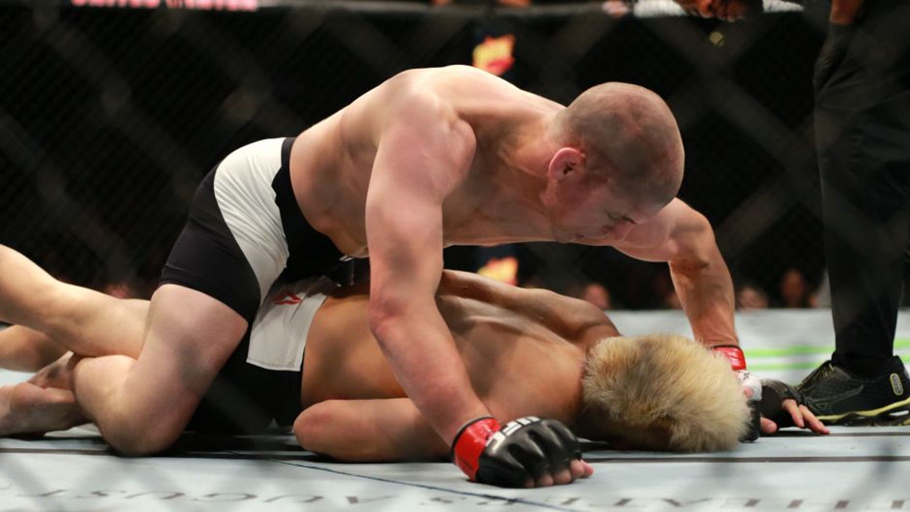 CHICAGO, IL - JULY 25: Joe Lauzon (top) fights Takanori Gomiin their lightweight bout during the UFC event at the United Center on July 25, 2015 in Chicago, Illinois. (Photo by Rey Del Rio/Zuffa LLC/Zuffa LLC via Getty Images)
