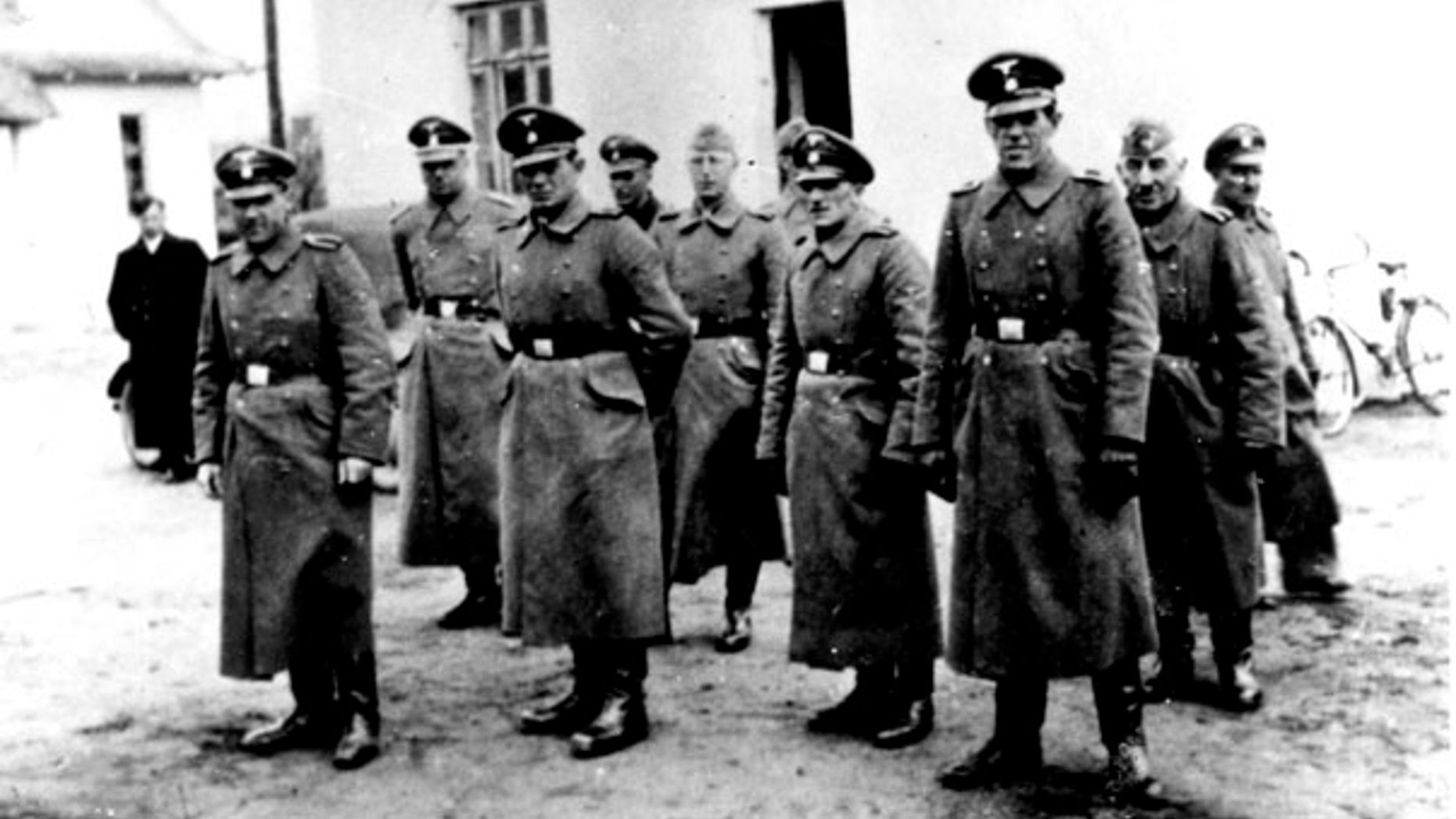 FILE: Nazi guards are seen at the Belzec death camp in Poland in 1942. Samuel Kunz, 90, a suspected former Nazi guard at Belzec, has been charged with participating in the murder of 430,000 Jews and other crimes during the Third Reich.