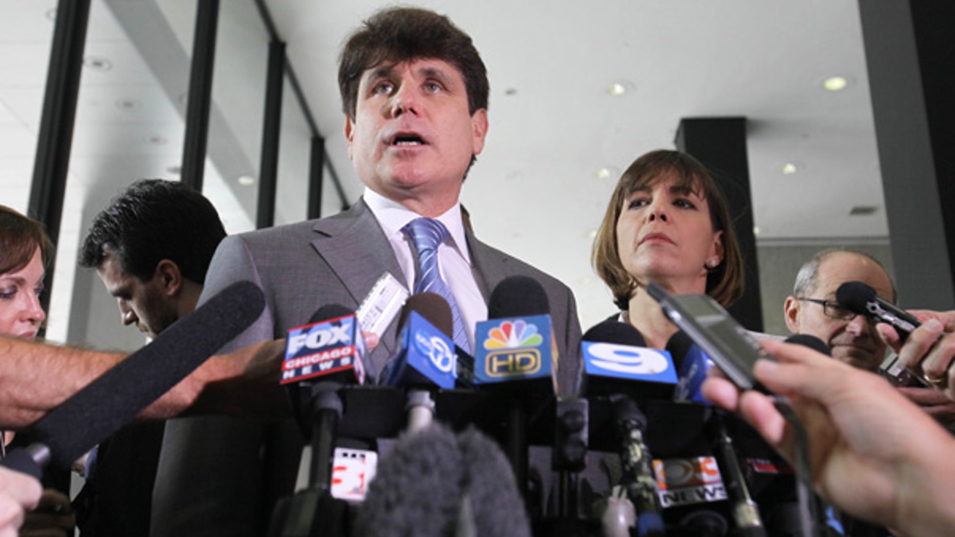 July 28: Former Illinois Gov. Rod Blagojevich speaks to the media at the Federal Court building in Chicago