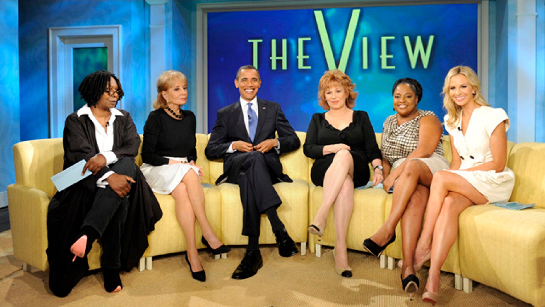July 28: In this publicity image released by ABC, President Obama joins the co-hosts, from left, Whoopi Goldberg, Barbara Walters, Joy Behar, Sherri Shepherd and Elisabeth Hasselbeck on the set of the ABC daytime talk show "The View."