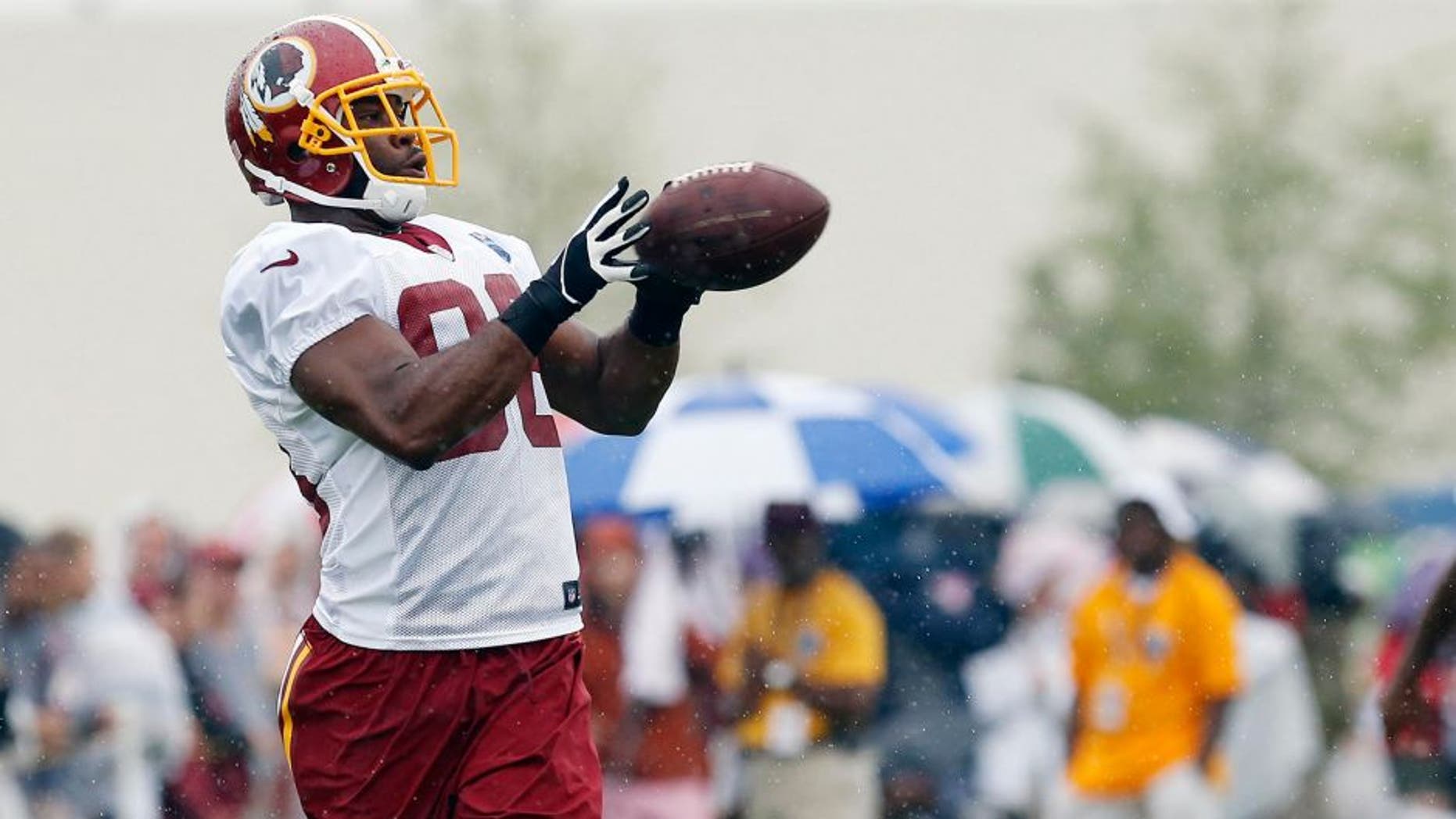 Jul 24, 2014; Richmond, VA, USA; Washington Redskins wide receiver Pierre Garcon (88) catches the ball during practice on day one of training camp at Bon Secours Washington Redskins Training Center. Mandatory Credit: Geoff Burke-USA TODAY Sports