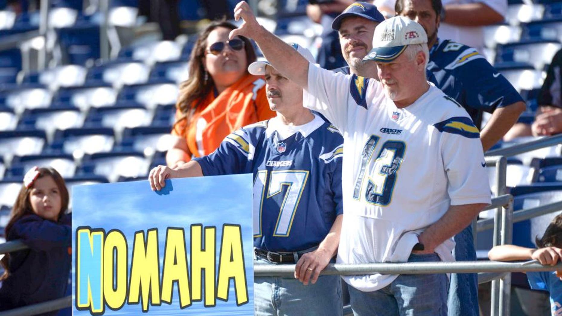 Dec 14, 2014; San Diego, CA, USA; San Diego Chargers fans react as the Denver Broncos take the field for pre-game warmups at Qualcomm Stadium. Mandatory Credit: Robert Hanashiro-USA TODAY Sports