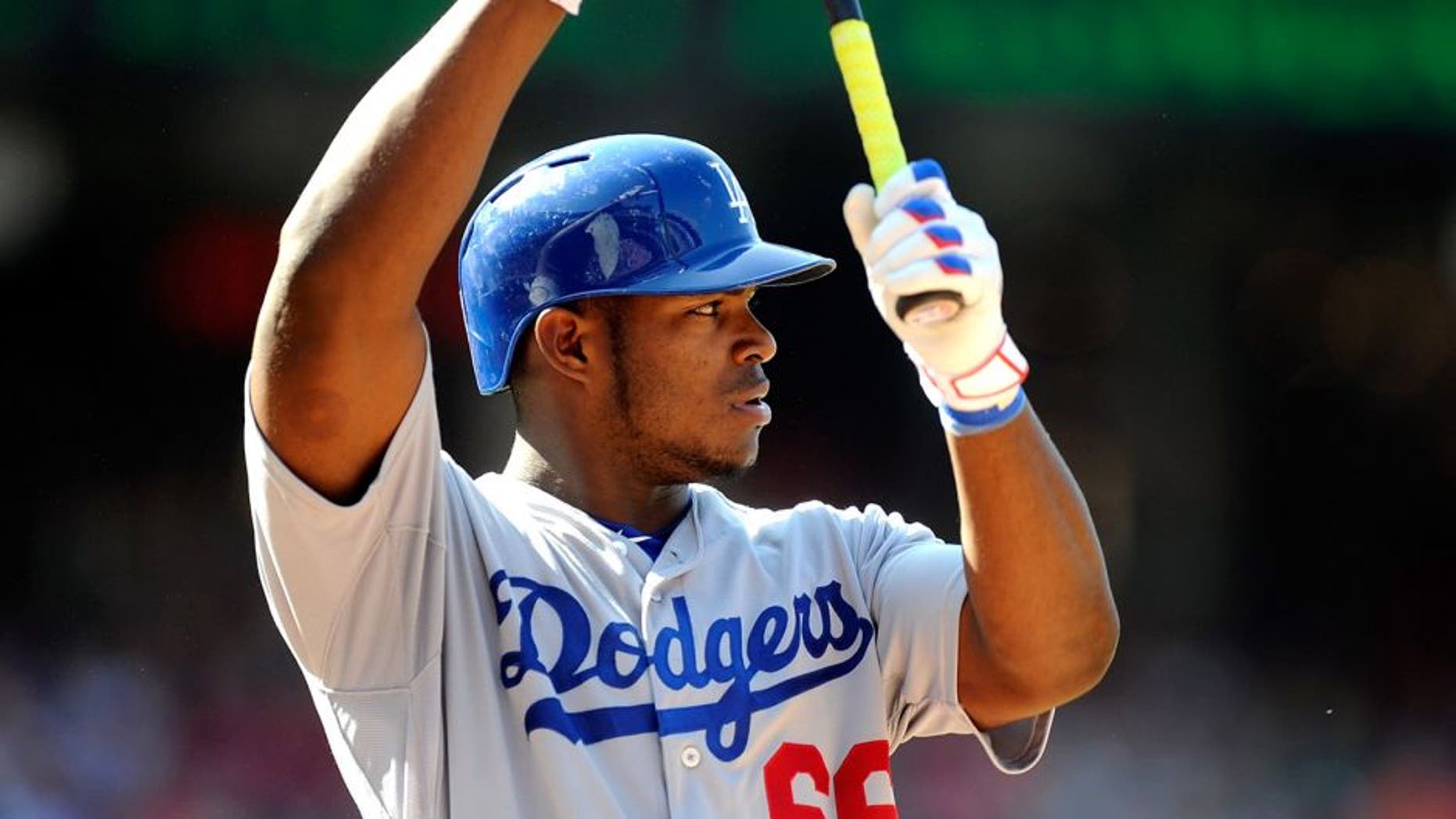 WASHINGTON, DC - JULY 18: Yasiel Puig #66 of the Los Angeles Dodgers bats against the Washington Nationals at Nationals Park on July 18, 2015 in Washington, DC. (Photo by G Fiume/Getty Images)