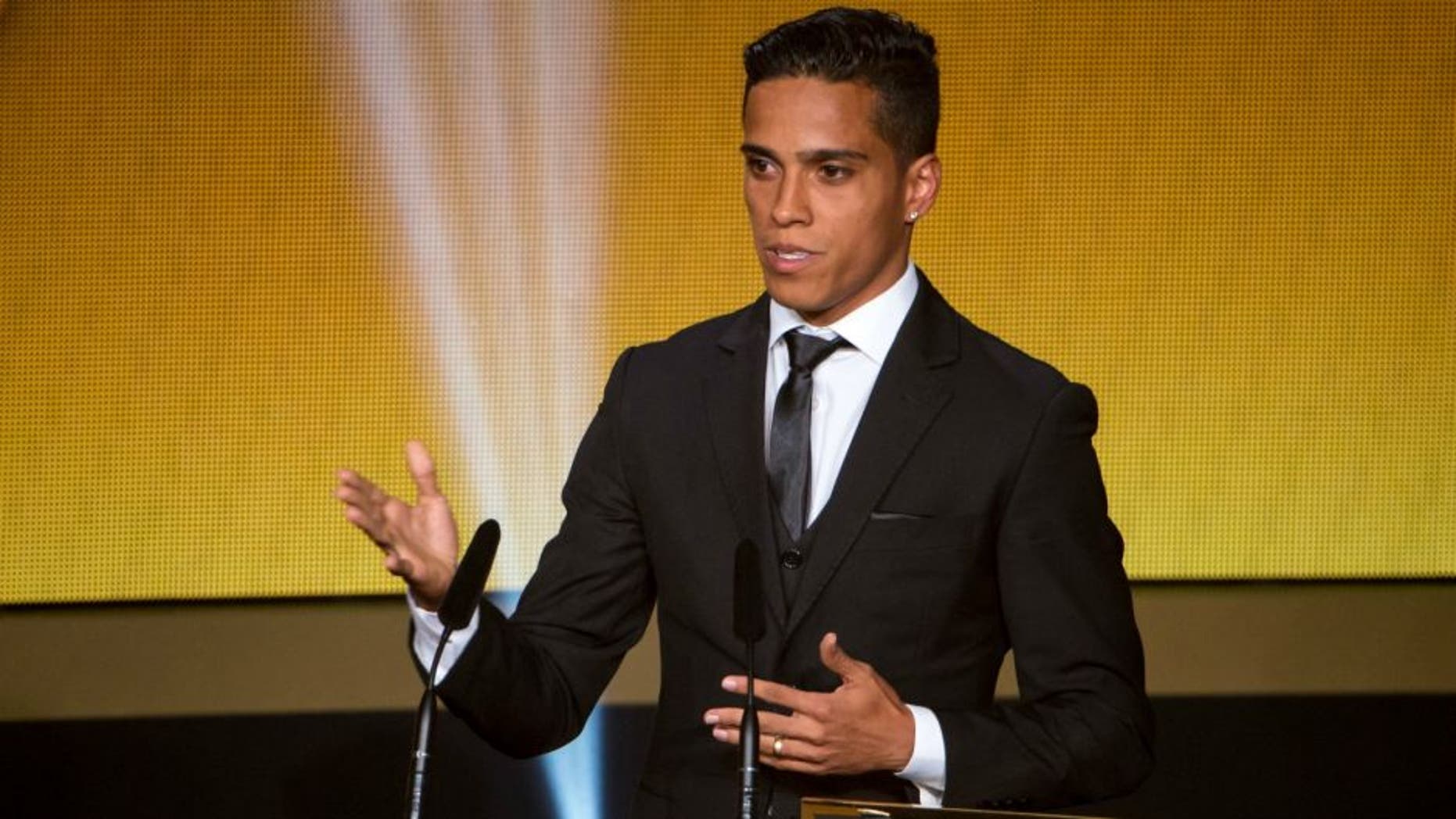 ZURICH, SWITZERLAND - JANUARY 11: FIFA Puskas Award for the best goal winner Wendell Lira of Brazil and Vila Nova arrives on stage to deliver a speech during the FIFA Ballon d'Or Gala 2015 at the Kongresshaus on January 11, 2016 in Zurich, Switzerland. (Photo by Philipp Schmidli/Getty Images)
