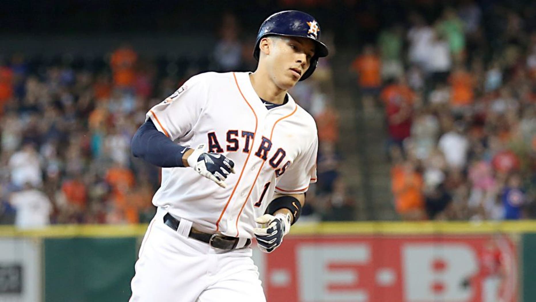 Jul 28, 2015; Houston, TX, USA; Houston Astros shortstop Carlos Correa (1) rounds the bases after hitting a home run against the Los Angeles Angels in the first inning at Minute Maid Park. Mandatory Credit: Thomas B. Shea-USA TODAY Sports