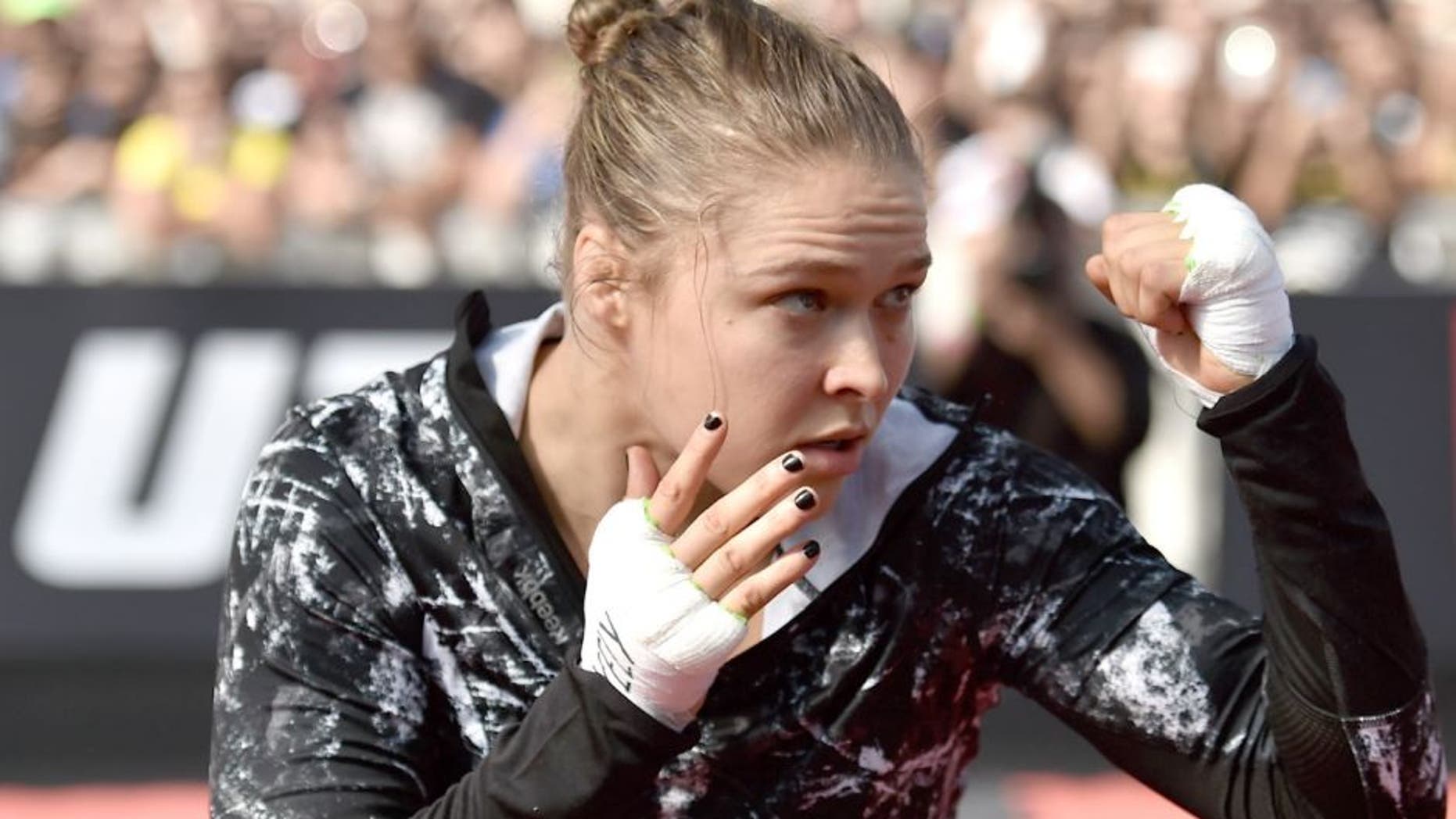 RIO DE JANEIRO, BRAZIL - JULY 29: Womens bantamweight champion Ronda Rousey of the United States holds an open training session at Pepe Beach on July 29, 2015 in Rio de Janeiro, Brazil. (Photo by Buda Mendes/Zuffa LLC/Zuffa LLC via Getty Images)