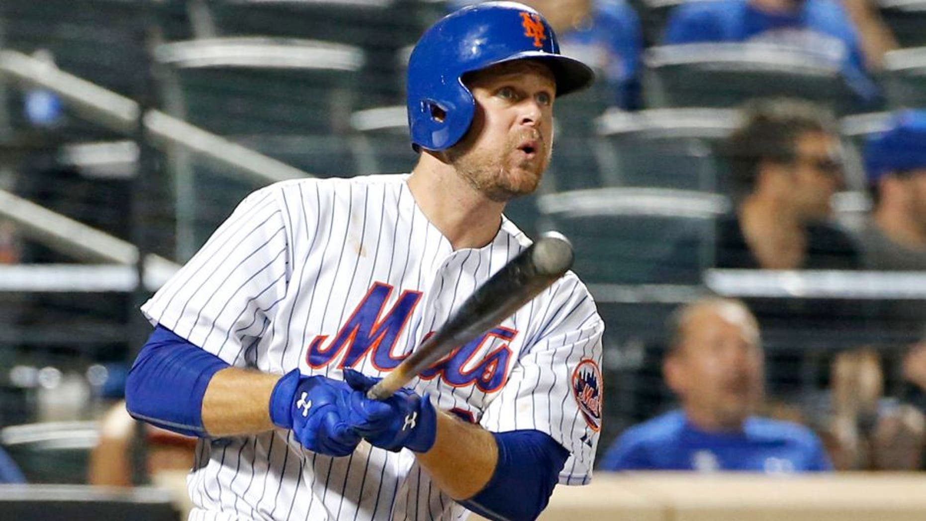 New York Mets' Lucas Duda watches his ninth-inning solo home run during a baseball game against the San Diego Padres in New York, Wednesday, July 29, 2015. The Padres won 7-3. (AP Photo/Kathy Willens)