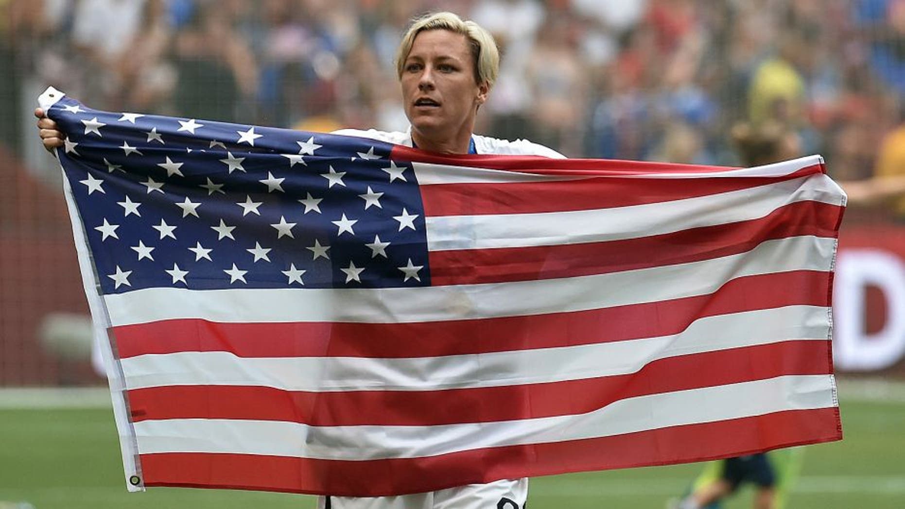 VANCOUVER, BC - JULY 05: Abby Wambach #20 of the United States celebrates the 5-2 victory against Japan in the FIFA Women's World Cup Canada 2015 Final at BC Place Stadium on July 5, 2015 in Vancouver, Canada. (Photo by Rich Lam/Getty Images)