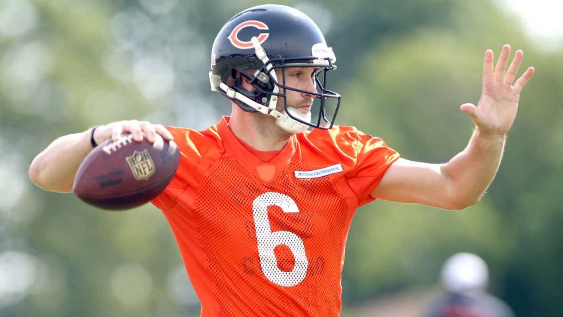 Jul 25, 2014; Chicago, IL, USA; Chicago Bears quarterback Jay Cutler throws a pass during training camp at Olivet Nazarene University. Mandatory Credit: Jerry Lai-USA TODAY Sports