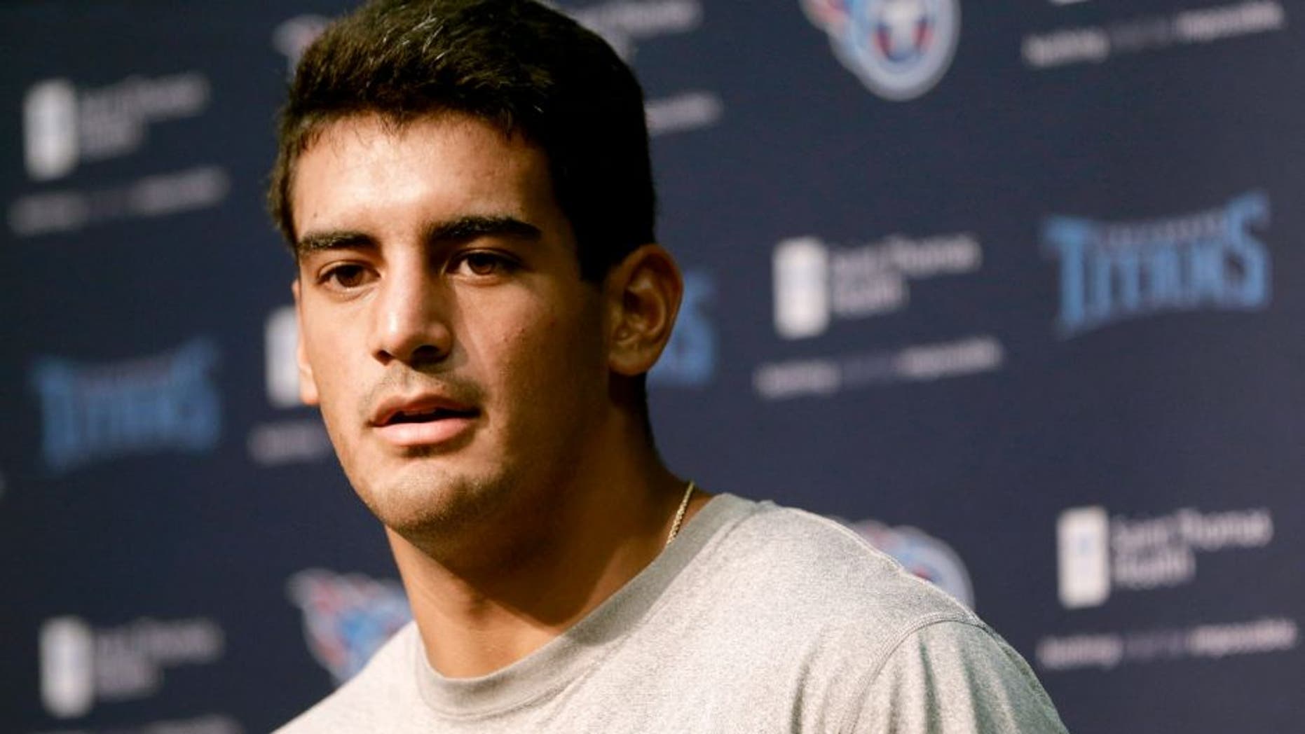 Tennessee Titans quarterback Marcus Mariota answers a question during a news conference Thursday, July 30, 2015, in Nashville, Tenn. The Titans begin NFL football training camp Friday. (AP Photo/Mark Humphrey)