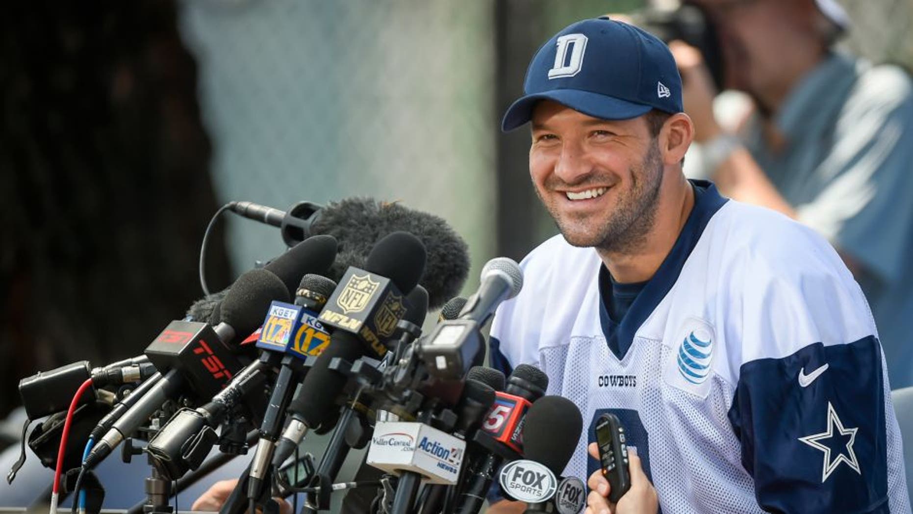 Dallas Cowboys quarterback Tony Romo takes questions from the media after morning practice during Dallas Cowboys NFL football training camp, Thursday, July 30, 2015, in Oxnard, Calif. (AP Photo/Gus Ruelas)
