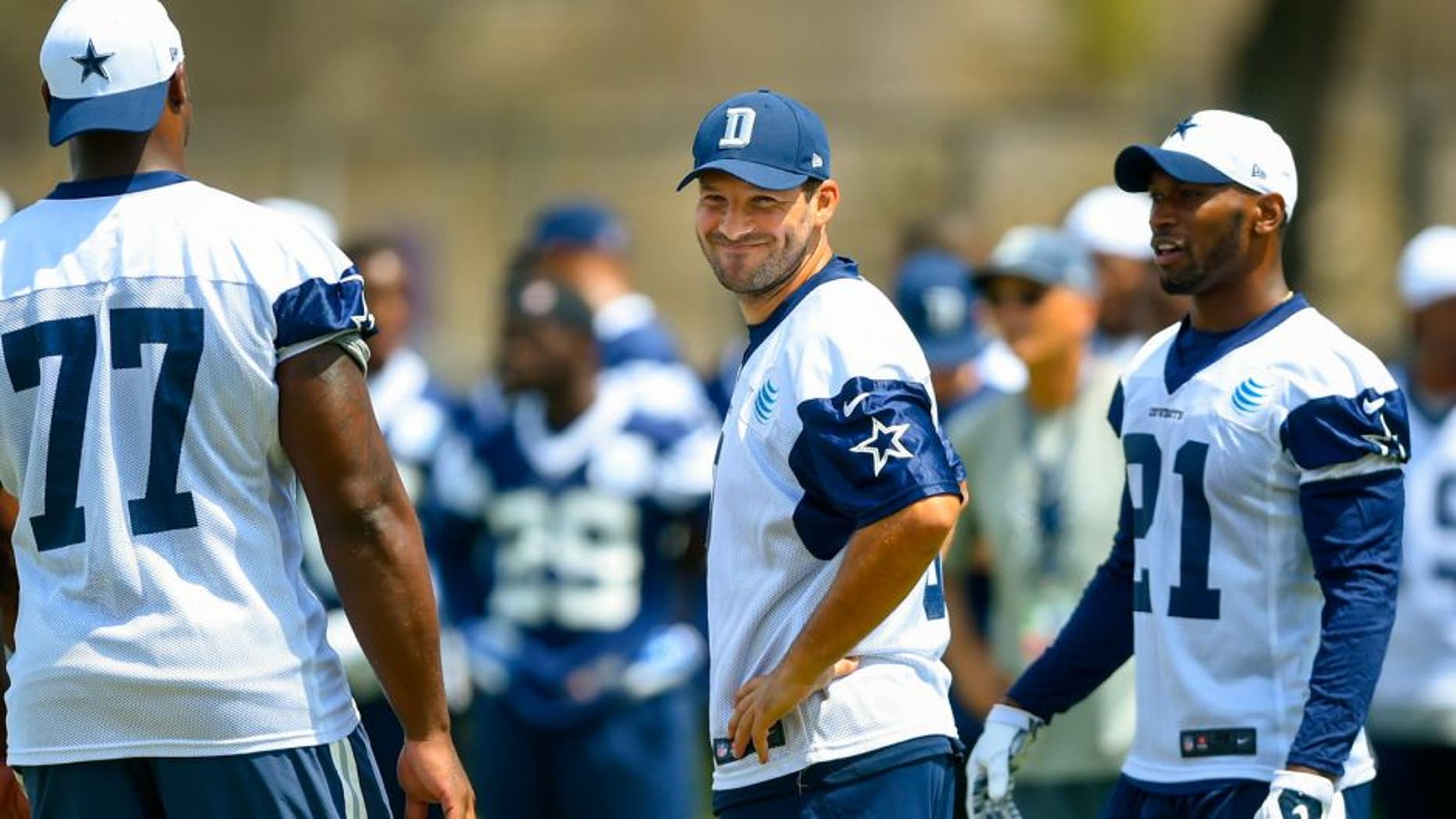 Dallas Cowboys quarterback Tony Romo (9) reacts after a botched play during the team's NFL football training camp, Thursday, July 30, 2015, in Oxnard, Calif. (AP Photo/Gus Ruelas)