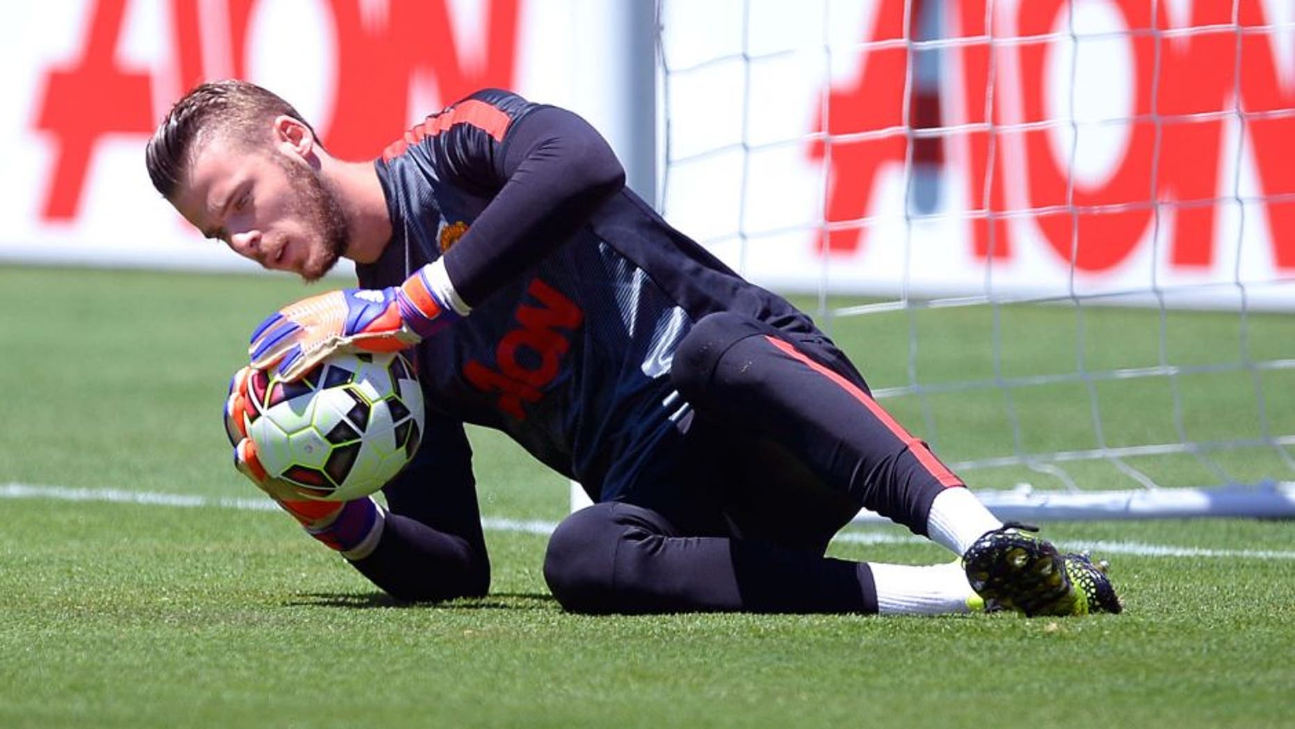 SANTA CLARA, CA - JULY 25: Goalkeeper David De Gea #1 of Manchester United dives for the ball during warm up before the start of International Champions Cup friendly soccer match against FC Barcelona at the Levi's Stadium July 25, 2015 in Santa Clara, California. (Photo by Kevork Djansezian/Getty Images)