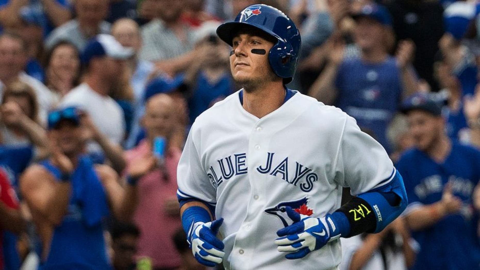 TORONTO, ON- JULY 29 - Troy Tulowitzki runs to home base after hitting a two-run home run in the third inning during a Blue Jays game against the Philadelphia Phillies at the Rogers Centre. July 29, 2015 (Melissa Renwick/Toronto Star via Getty Images)