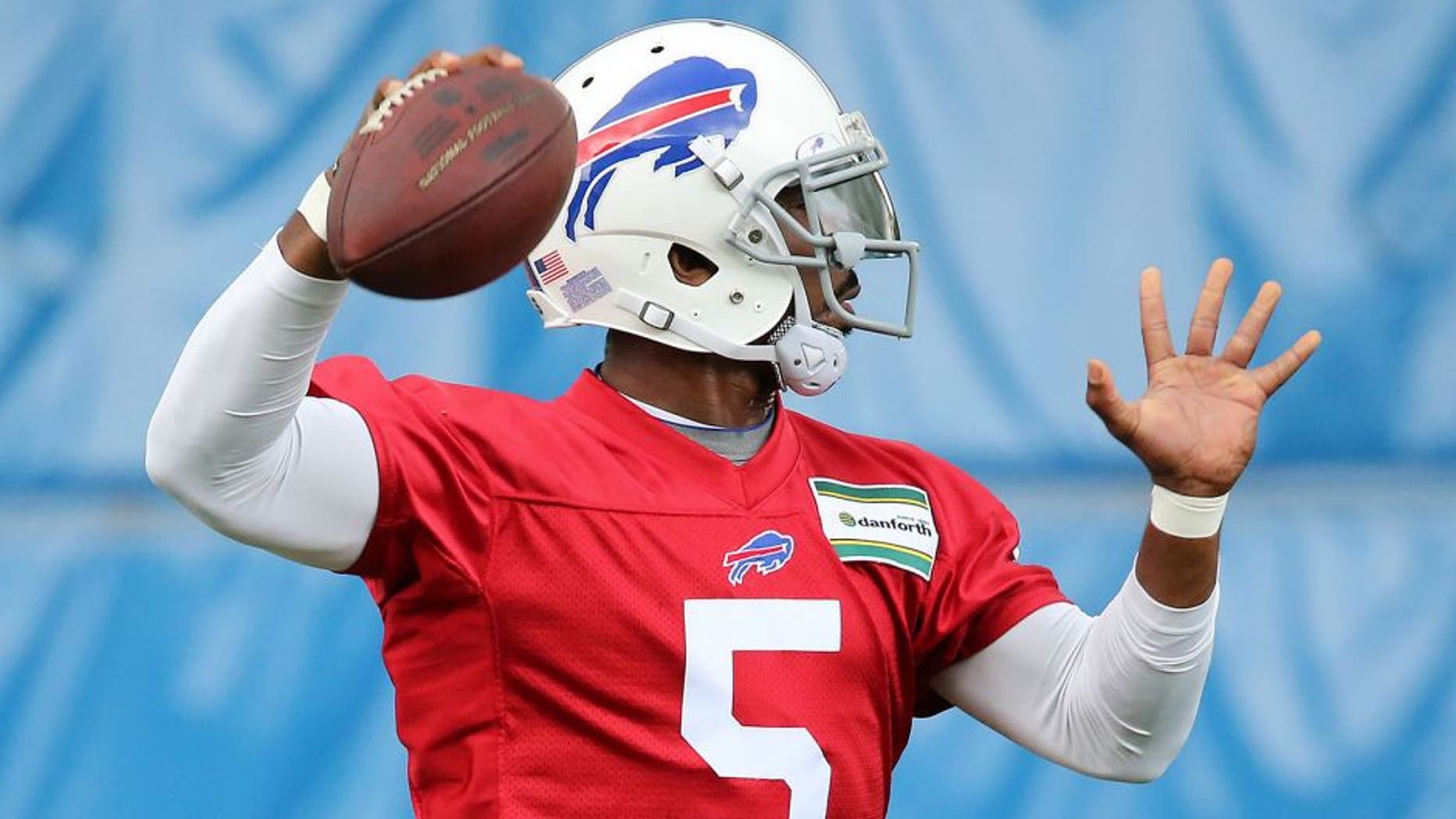 May 26, 2015; Orchard Park, NY, USA; Buffalo Bills quarterback Tyrod Taylor (5) throws a pass during the organized team activities at the ADPRO Sports Training Center. Mandatory Credit: Kevin Hoffman-USA TODAY Sports