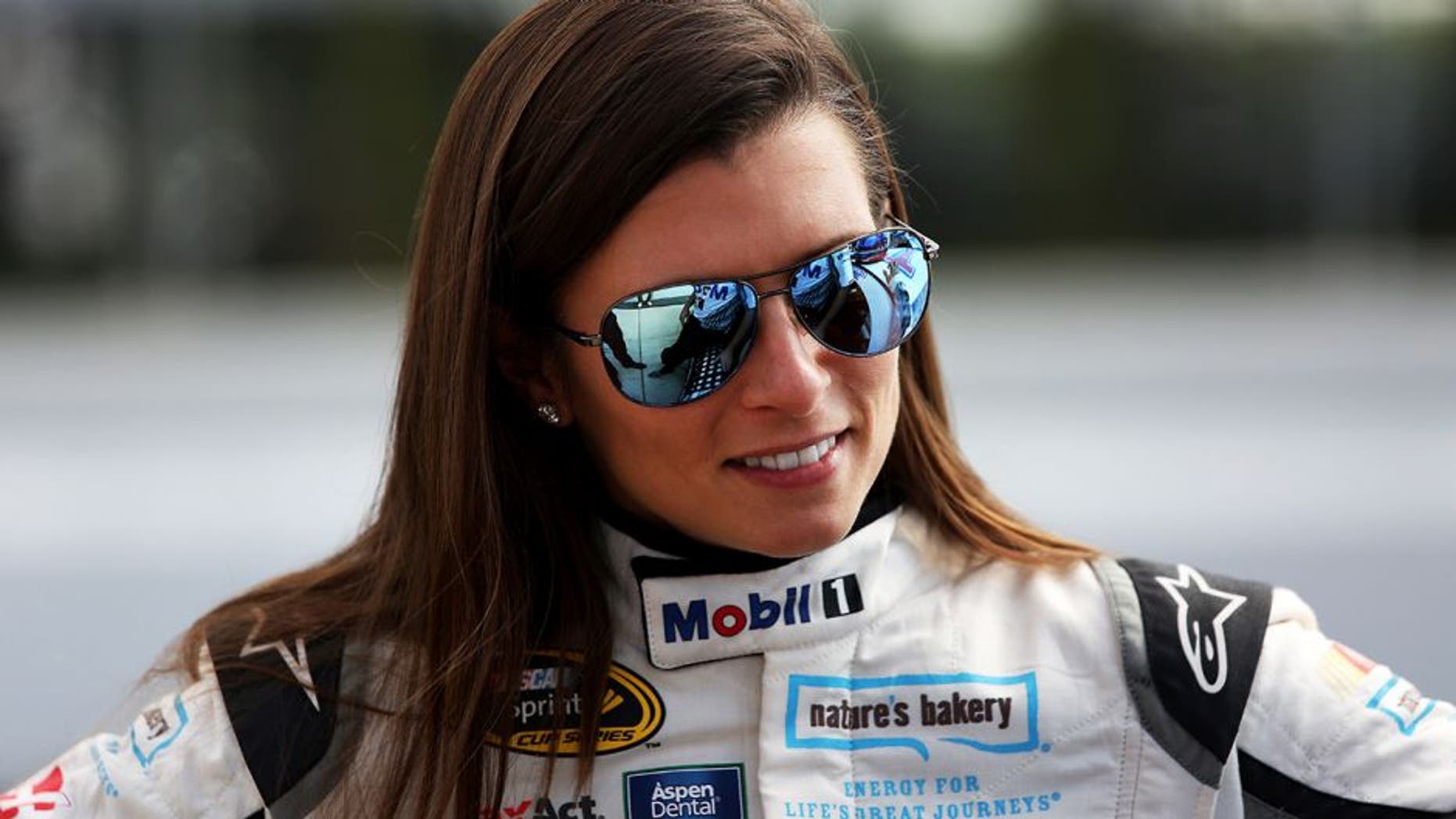 LONG POND, PA - JULY 29: Danica Patrick, driver of the #10 Mobil 1 Chevrolet, stands on the grid during qualifying for the NASCAR Sprint Cup Series Pennsylvania 400 at Pocono Raceway on July 29, 2016 in Long Pond, Pennsylvania. (Photo by Adam Glanzman/Getty Images)