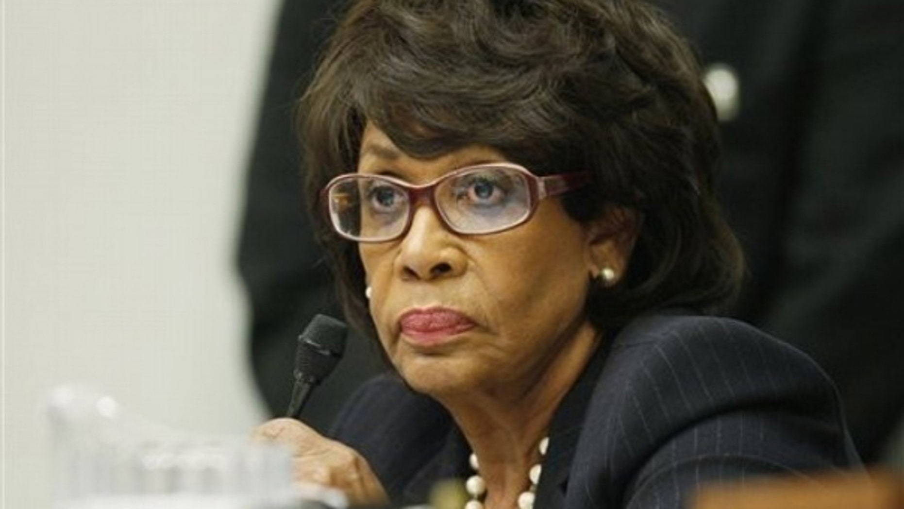 In this file photo, Rep. Maxine Waters is seen on Capitol Hill in Washington as she questions witnesses during a hearing on legal issues relating to football head injuries.