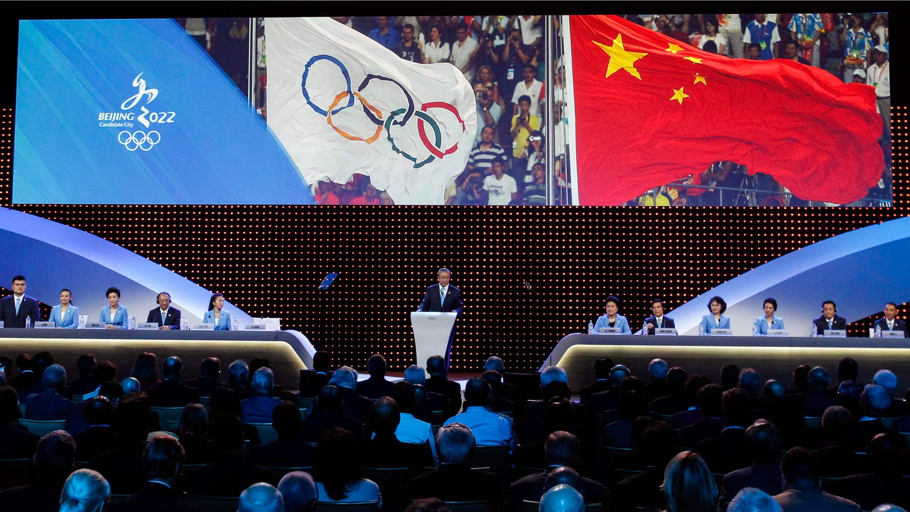 July 31, 2015: Chinese delegation, from left, Yao Ming, Li Nina, Yang Lan, Liu Peng, Yang Yang, Vice President of the China Olympics Council Yu Zaiqing, China Vice Premier Liu Yandong, Wang Anshun, Zhang Haidi, Li Lingwei, Hou Liang and Zhang Li attend the Beijing's bid presentation for the host city for the 2022 Winter Games, at the 128th International Olympic Committee session in Kuala Lumpur, Malaysia