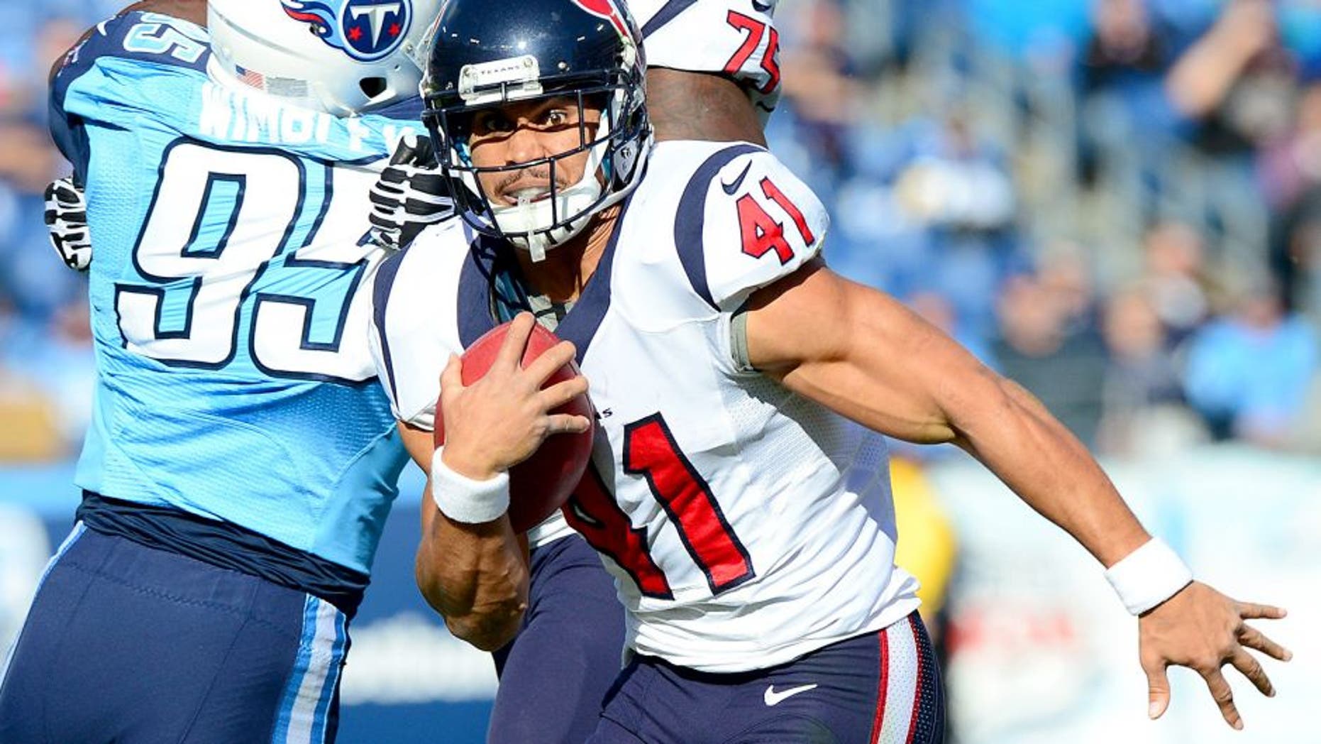 Dec 29, 2013; Nashville, TN, USA; Houston Texans running back Jonathan Grimes (41) carries the ball against the Tennessee Titans during the first half at LP Field. The Titans won 16-10. Mandatory Credit: Don McPeak-USA TODAY Sports