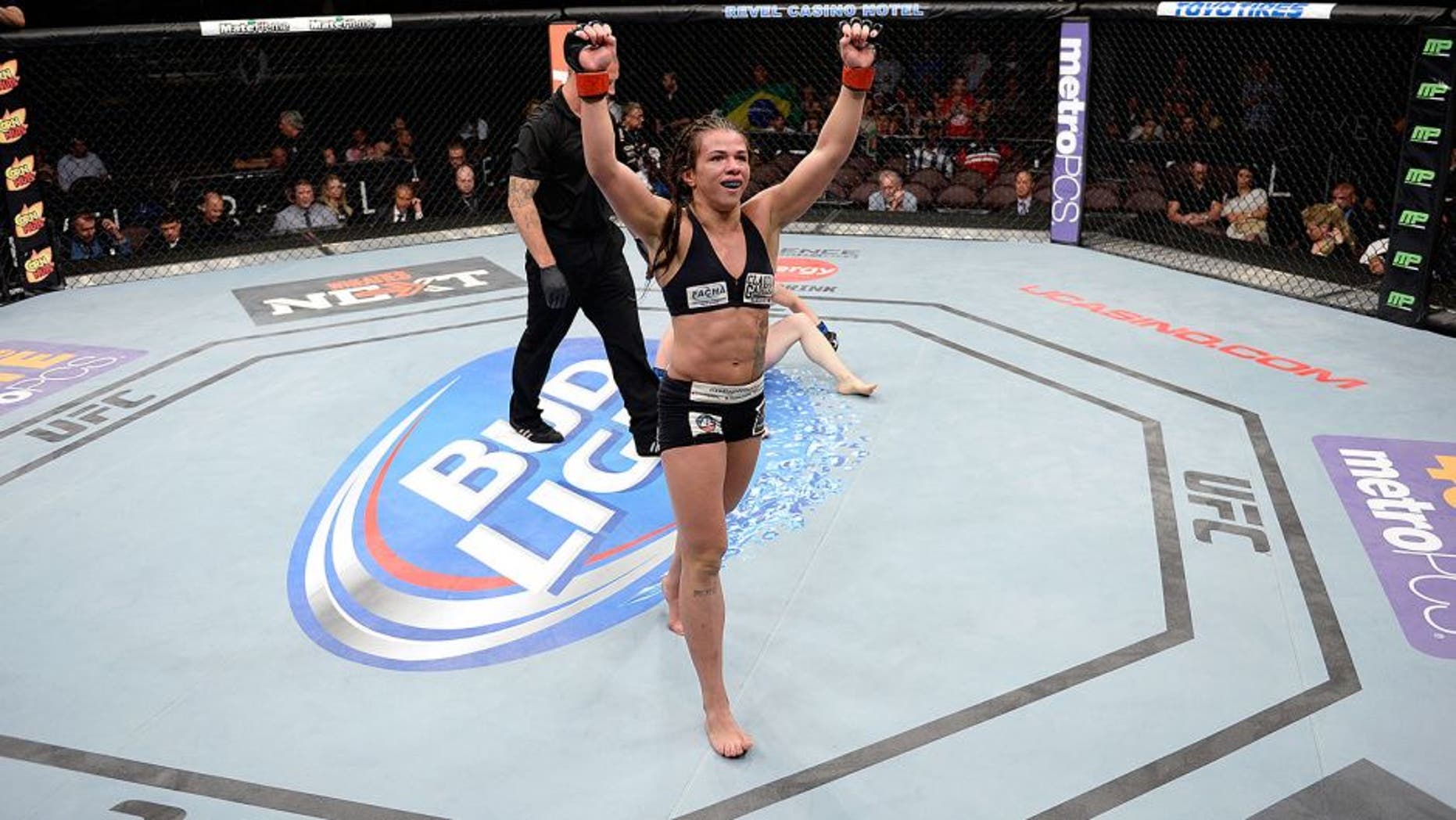 ATLANTIC CITY, NJ - JULY 16: Claudia Gadelha celebrates after defeating Tina Lahdemaki in their women's strawweight bout during the UFC Fight Night event at Revel Casino on July 16, 2014 in Atlantic City, New Jersey. (Photo by Jeff Bottari/Zuffa LLC/Zuffa LLC via Getty Images) *** Local Caption ***Claudia Gadelha;Tina Lahdemaki