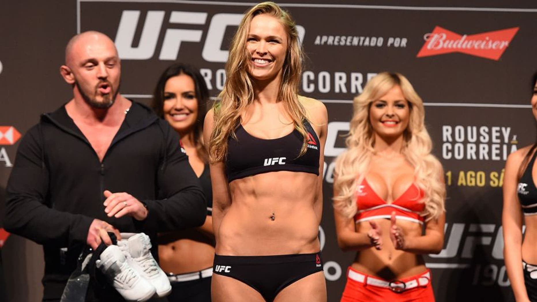 RIO DE JANEIRO, BRAZIL - JULY 31: UFC strawweight champion Ronda Rousey steps onto the scale during the UFC 190 weigh-in inside HSBC Arena on July 31, 2015 in Rio de Janeiro, Brazil. (Photo by Josh Hedges/Zuffa LLC/Zuffa LLC via Getty Images)