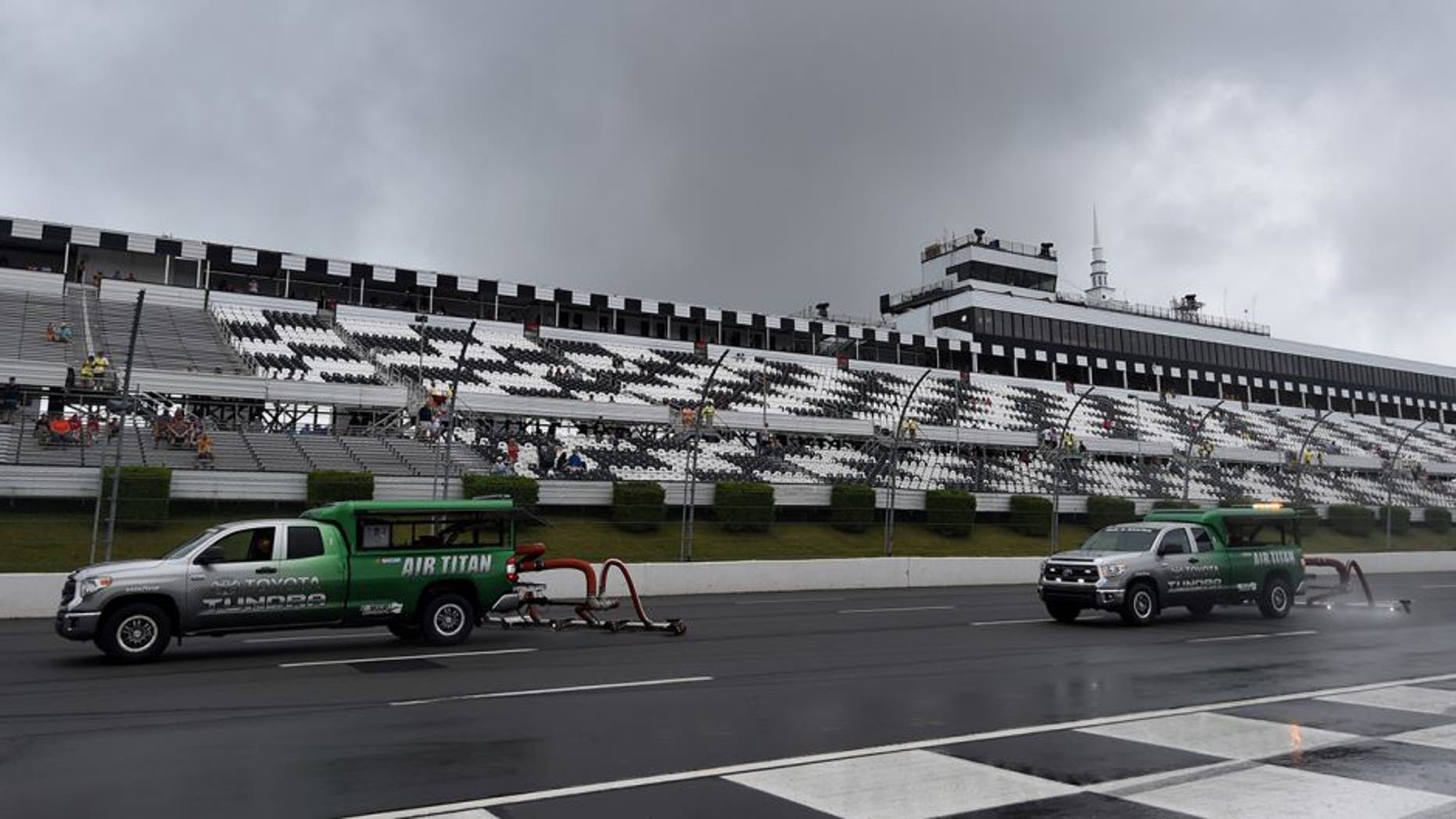 LONG POND, PA - JULY 31: Air Titan's dry the track during rainy weather prior to the NASCAR Sprint Cup Series Pennsylvania 400 at Pocono Raceway on July 31, 2016 in Long Pond, Pennsylvania. (Photo by Rainier Ehrhardt/NASCAR via Getty Images)