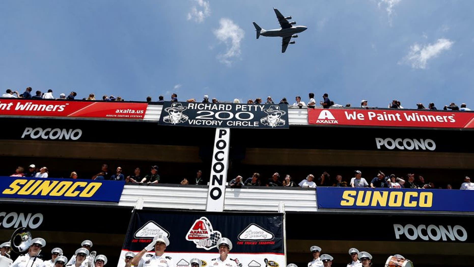 LONG POND, PA - JUNE 07: A fly-over is performed as part of pre-race ceremonies for the NASCAR Sprint Cup Series Axalta 'We Paint Winners' 400 at Pocono Raceway on June 7, 2015 in Long Pond, Pennsylvania. (Photo by Jeff Zelevansky/NASCAR via Getty Images)