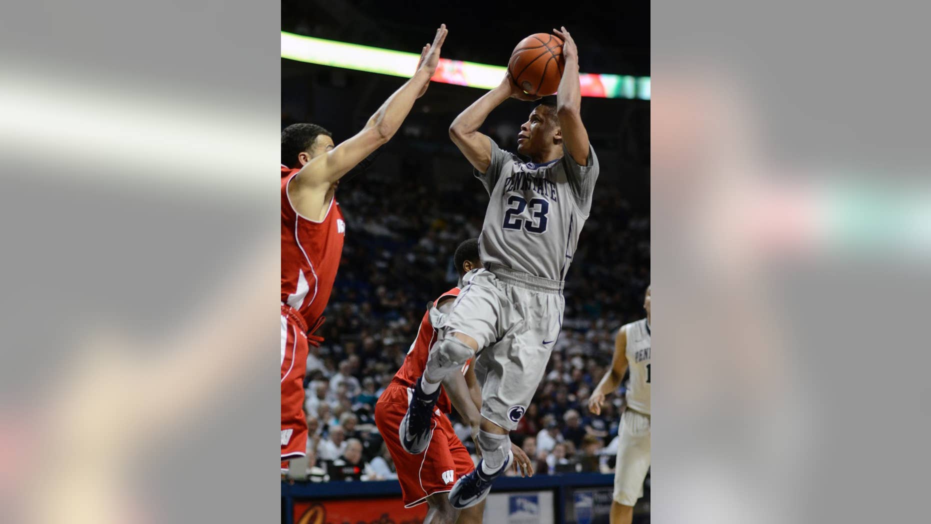 Penn State's Tim Frazier (23) looks for a shot during the first half of an NCAA college basketball game against Wisconsin, Sunday, March 2, 2014 in State College, Pa. (AP Photo/Ralph Wilson)