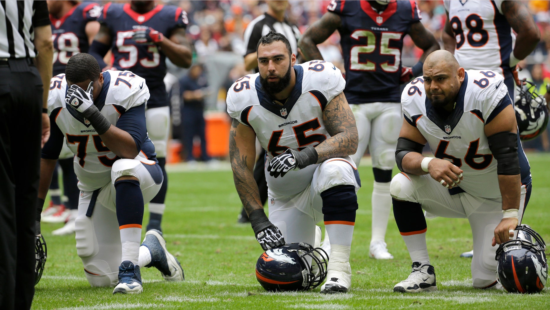 Denver Broncos Louis Vasquez (65) and Manny Ramírez (66) during a road game against the Houston Texans, Dec. 22, 2013. (AP Photo/David J. Phillip, File)