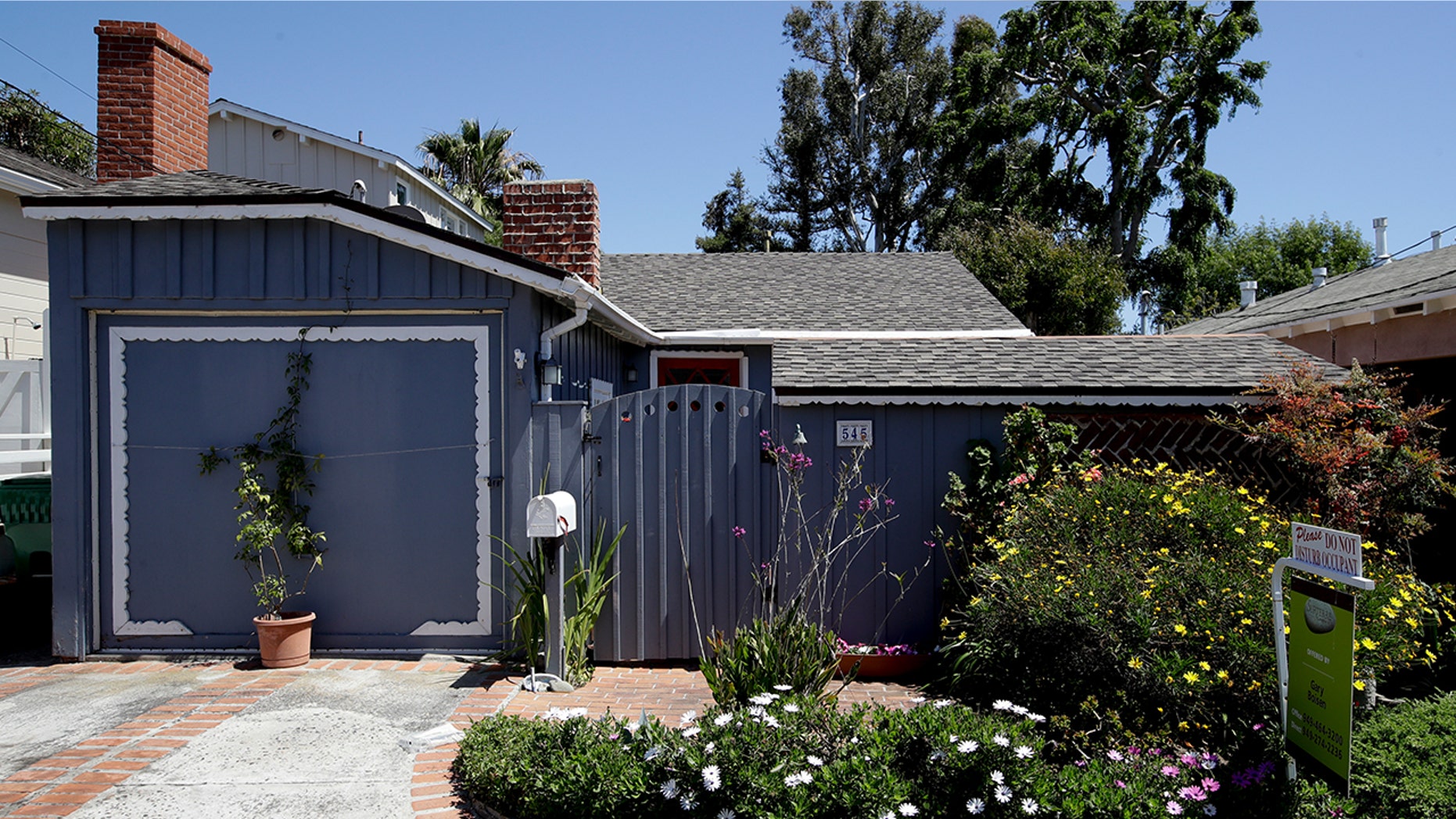 This tiny cottage on Lombardy Lane in Laguna Beach, Calif. is for sale at just shy of $1 millions is shown Friday, May 25, 2018. This one bedroom home is 595 square feet and is a few blocks from the ocean