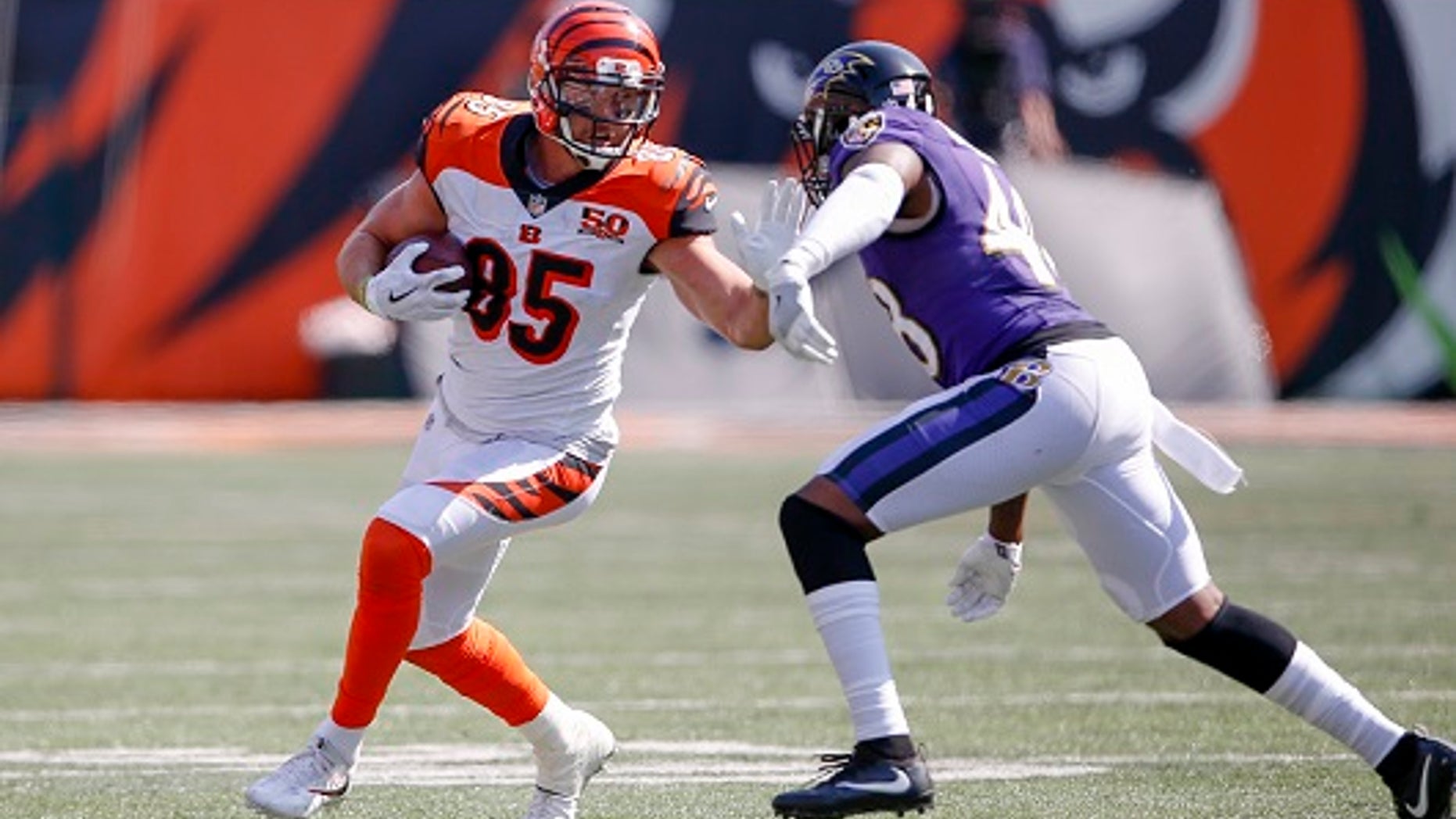 Cincinnati Bengals tight end Tyler Eifert explained in an essay that he stands for the American flag because he wants to honor U.S. service members.