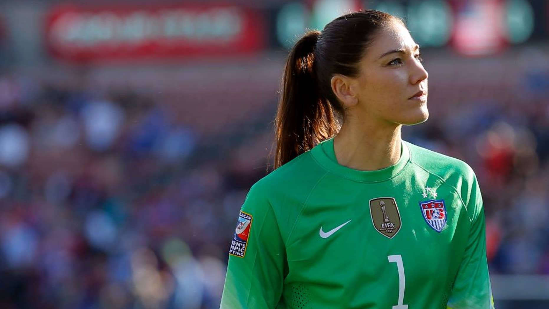 FILE - In this Feb. 13, 2016, file photo, United States goalie Hope Solo walks off the field at half time of a CONCACAF Olympic qualifying tournament soccer match against Mexico in Frisco, Texas. Solo has taken an indefinite leave from the Seattle Reign of the National Women's Soccer League, less than a week after being suspended for six months by the U.S. national team for disparaging remarks about Sweden, the Reign announced Saturday, Aug. 27, 2016. (AP Photo/Tony Gutierrez, File)