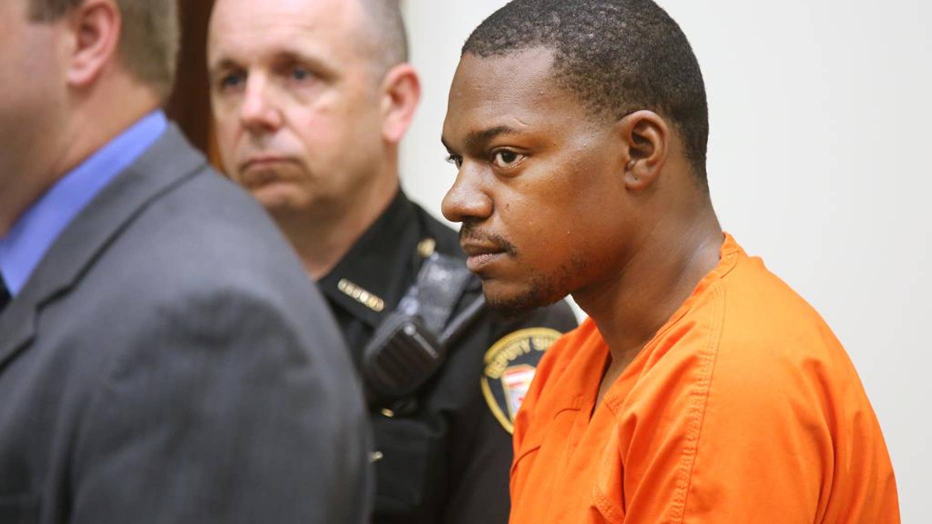Charles Crawford, 24, looks out into the Clermont County Municipal courtroom during his arraignment in front of Magistrate Anita Bechmann. Crawford is charged with aggravated murder in the death of his four-month-old daughter, Kaylynn Crawford. His bond was set at $2 million. He first reported she had been abducted from his car while at the Dollar Store in Loveland Sunday evening. Monday, he led authorities to her body in the Little Miami River near Kelley Nature Preserve. (Liz Dufour /The Cincinnati Enquirer via AP)